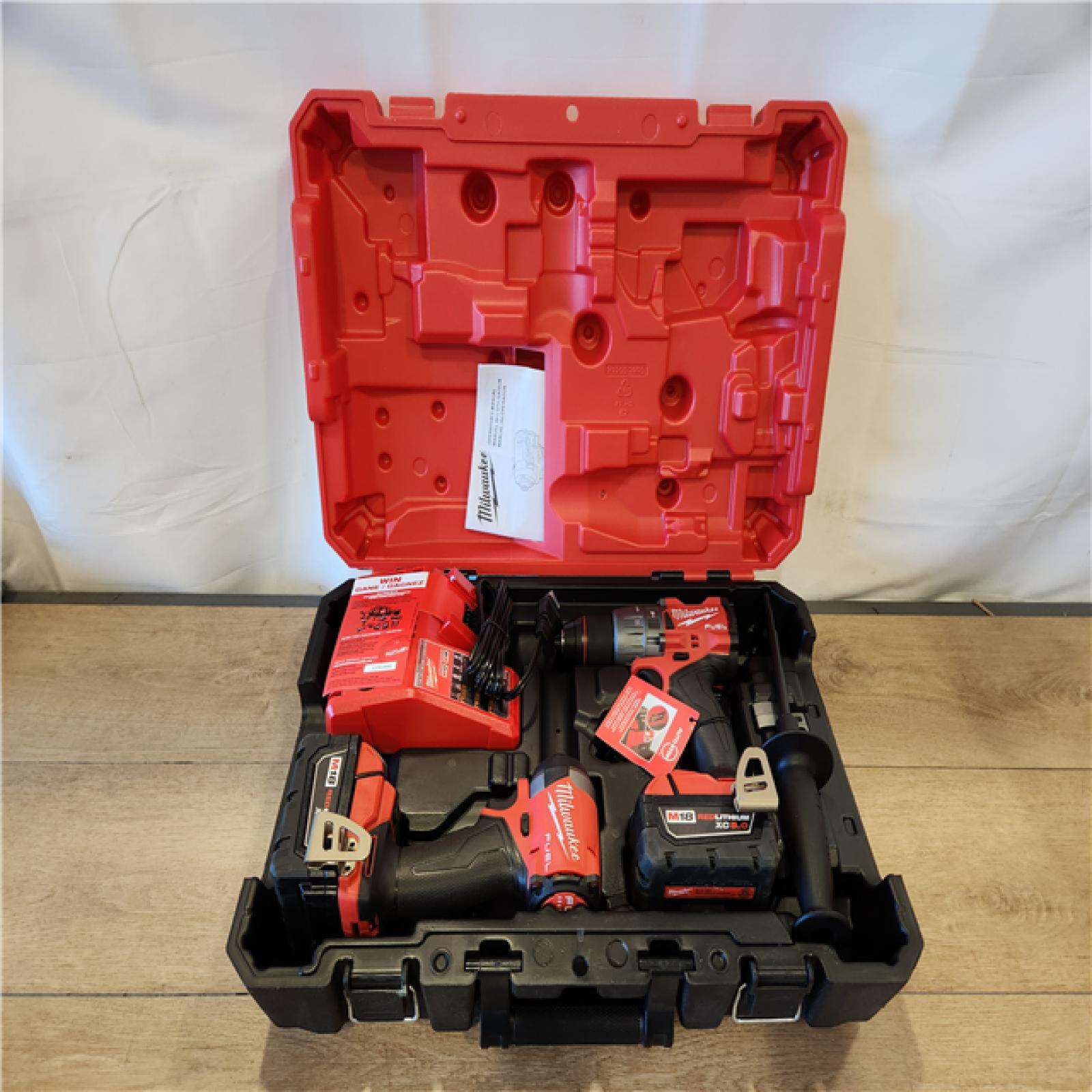 AS-IS- Milwaukee  FUEL 18V Lithium-Ion Brushless Cordless Hammer Drill and Impact Driver Combo Kit