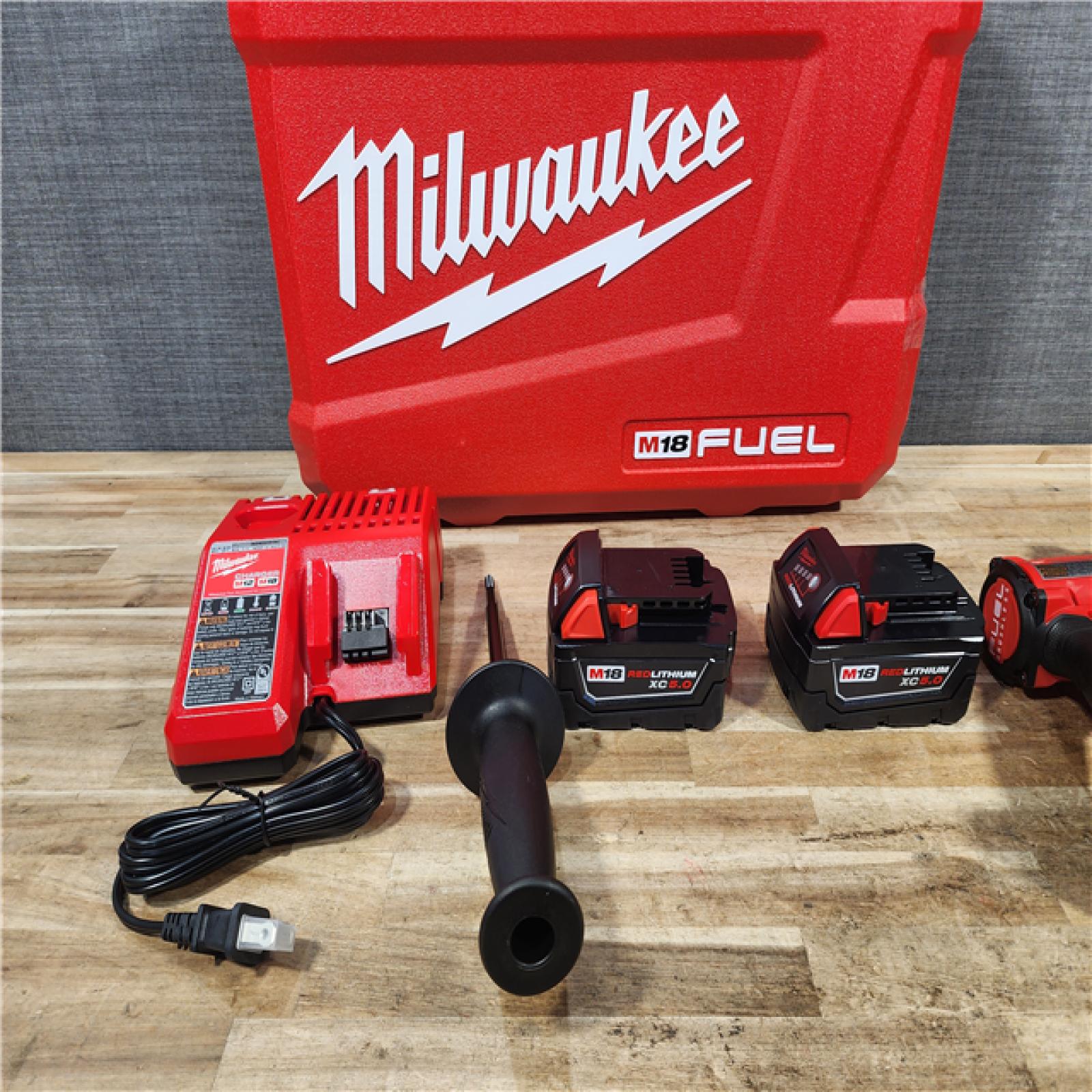 HOUSTON LOCATION - AS - IS Milwaukee FUEL 18V Lithium-Ion Brushless Cordless Hammer Drill and Impact Driver Combo Kit