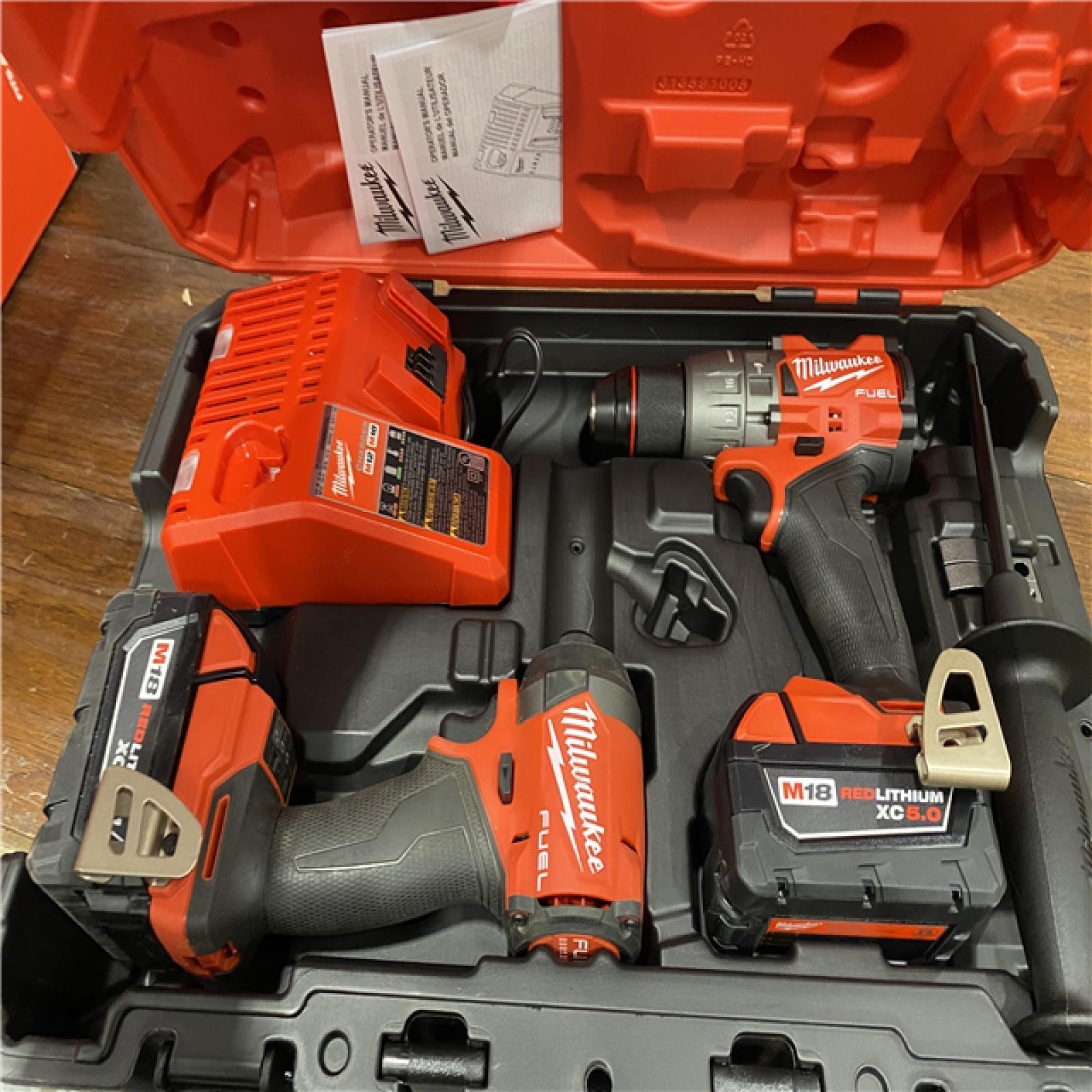 AS-IS MILWAUKEE M18 FUEL 18V Lithium-Ion Brushless Cordless Hammer Drill and Impact Driver Combo Kit (2-Tool) with 2 Batteries