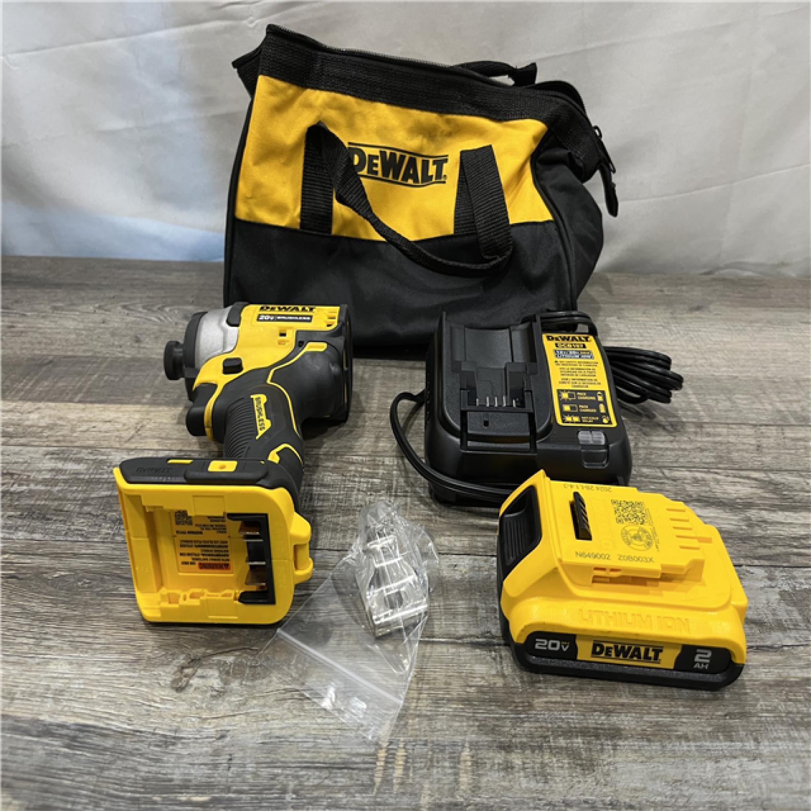 AS-IS DEWALT Atomic 20V Max Lithium-Ion Brushless Cordless Compact 1/4 in. Impact Driver Kit