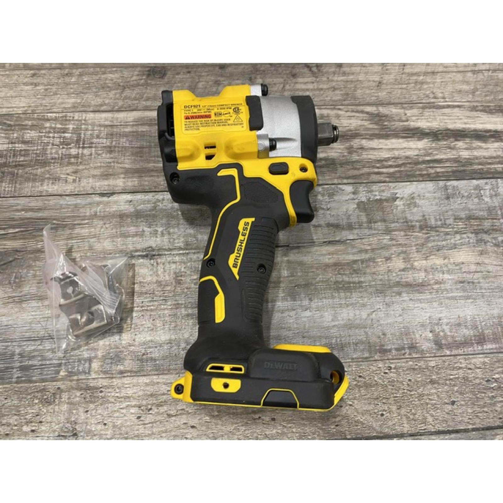 AS-IS DEWALT ATOMIC 20V MAX Cordless Brushless 1/2 in. Variable Speed Impact Wrench (Tool Only)