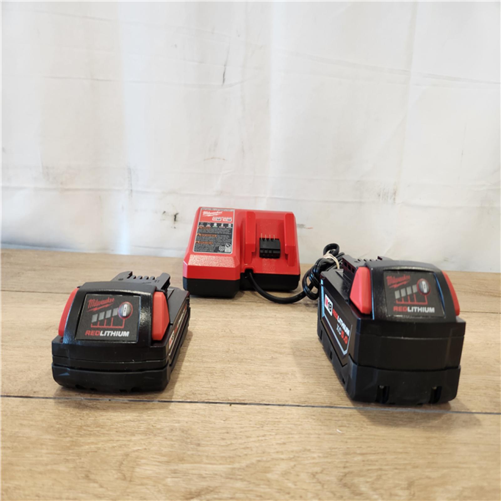 AS-IS- Milwaukee M18 Redlithium Xc5.0 Resistant Battery Starter Kit