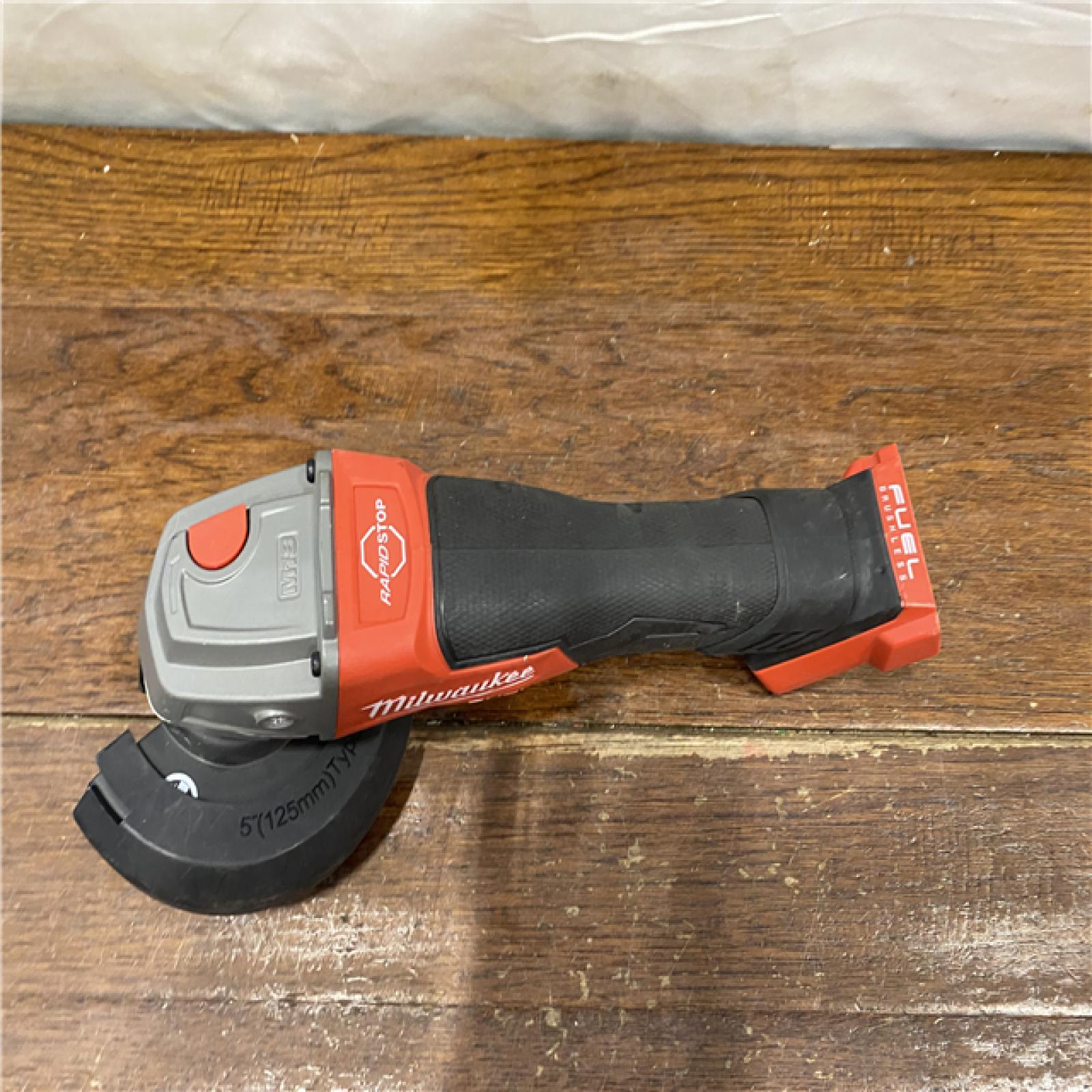 AS-IS Milwaukee 2880-20 M18 FUEL 18-Volt Lithium-Ion Brushless Cordless 4-1/2 in./5 in. Grinder W/Paddle Switch (Tool-Only)