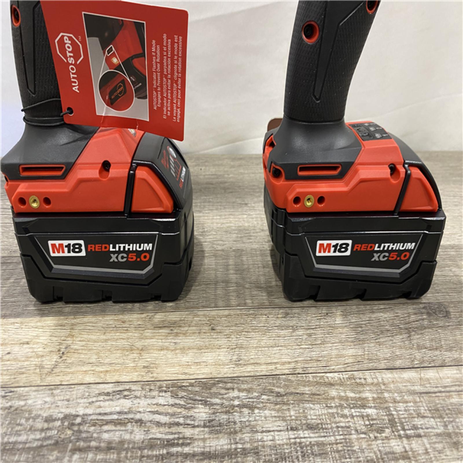 AS-IS Milwaukee FUEL 18V Lithium-Ion Brushless Cordless Hammer Drill & SURGE Impact Driver Combo Kit