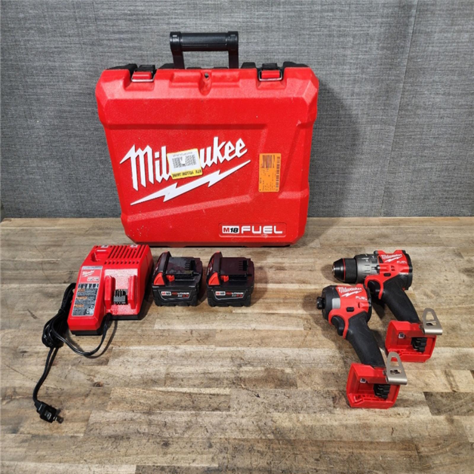 HOUSTON LOCATION - AS-IS MILWAUKEE FUEL 18V Lithium-Ion Brushless Cordless Hammer Drill and Impact Driver Combo Kit