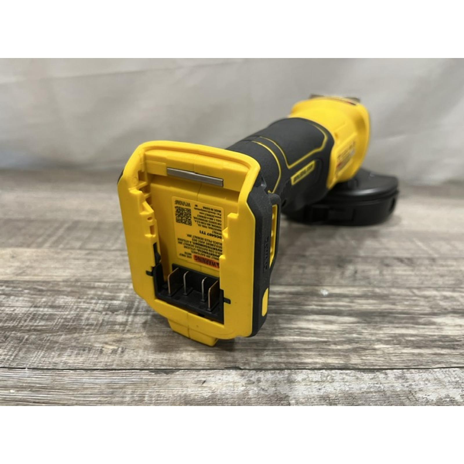 AS-IS DEWALT 20-Volt MAX Cordless Brushless 4-1/2 in. Angle Grinder with Slide Switch (Tool Only)