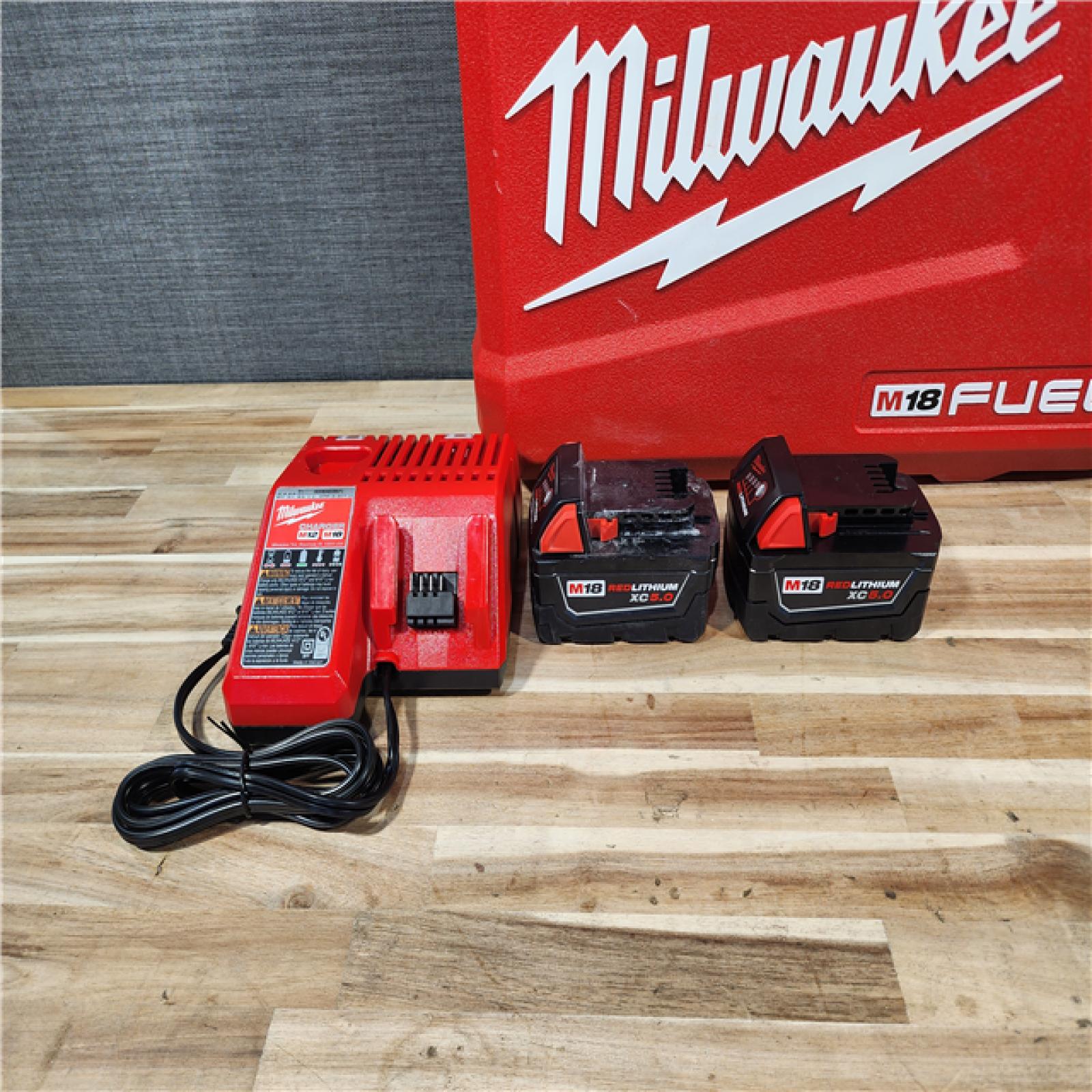 HOUSTON LOCATION - AS-IS Milwaukee  FUEL 18V Lithium-Ion Brushless Cordless Hammer Drill and Impact Driver Combo Kit