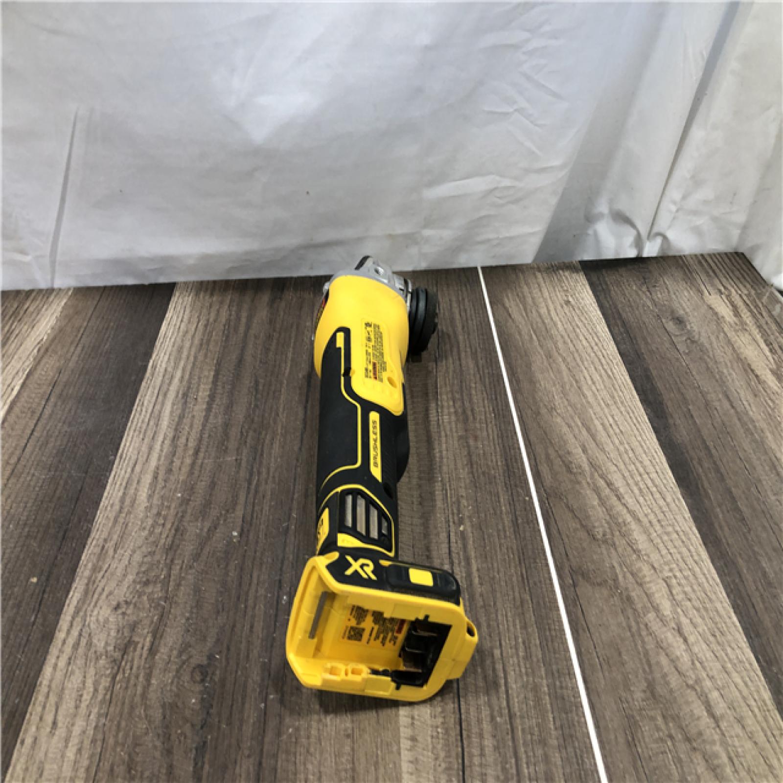 AS-IS DEWALT 20V MAX XR Cordless Brushless 4.5 in. Slide Switch Small Angle Grinder with Kickback Brake (Tool Only)