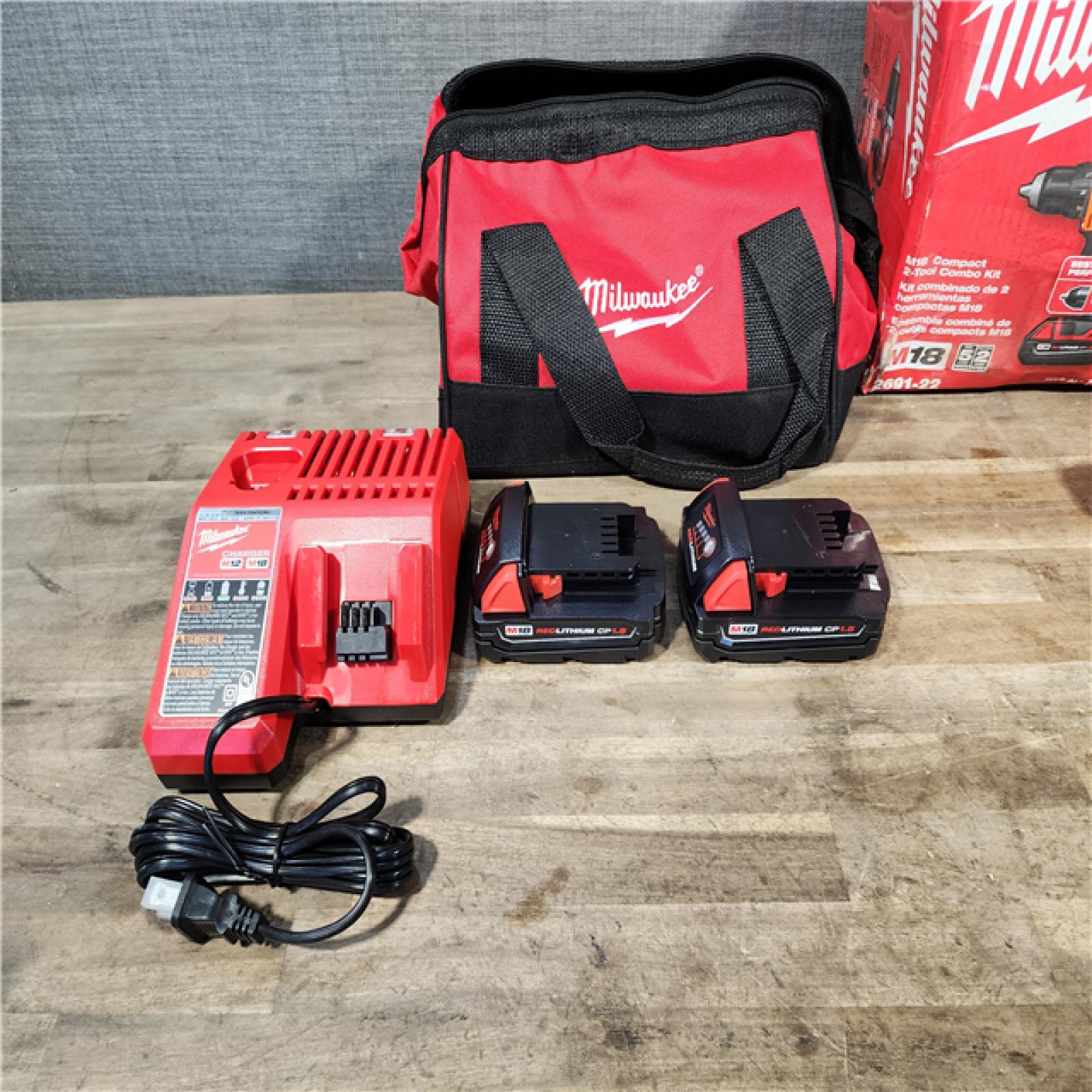 HOUSTON LOCATION - AS-IS Milwaukee 18V Cordless Brushed 2-Tool Drill/Driver and Impact Driver Kit