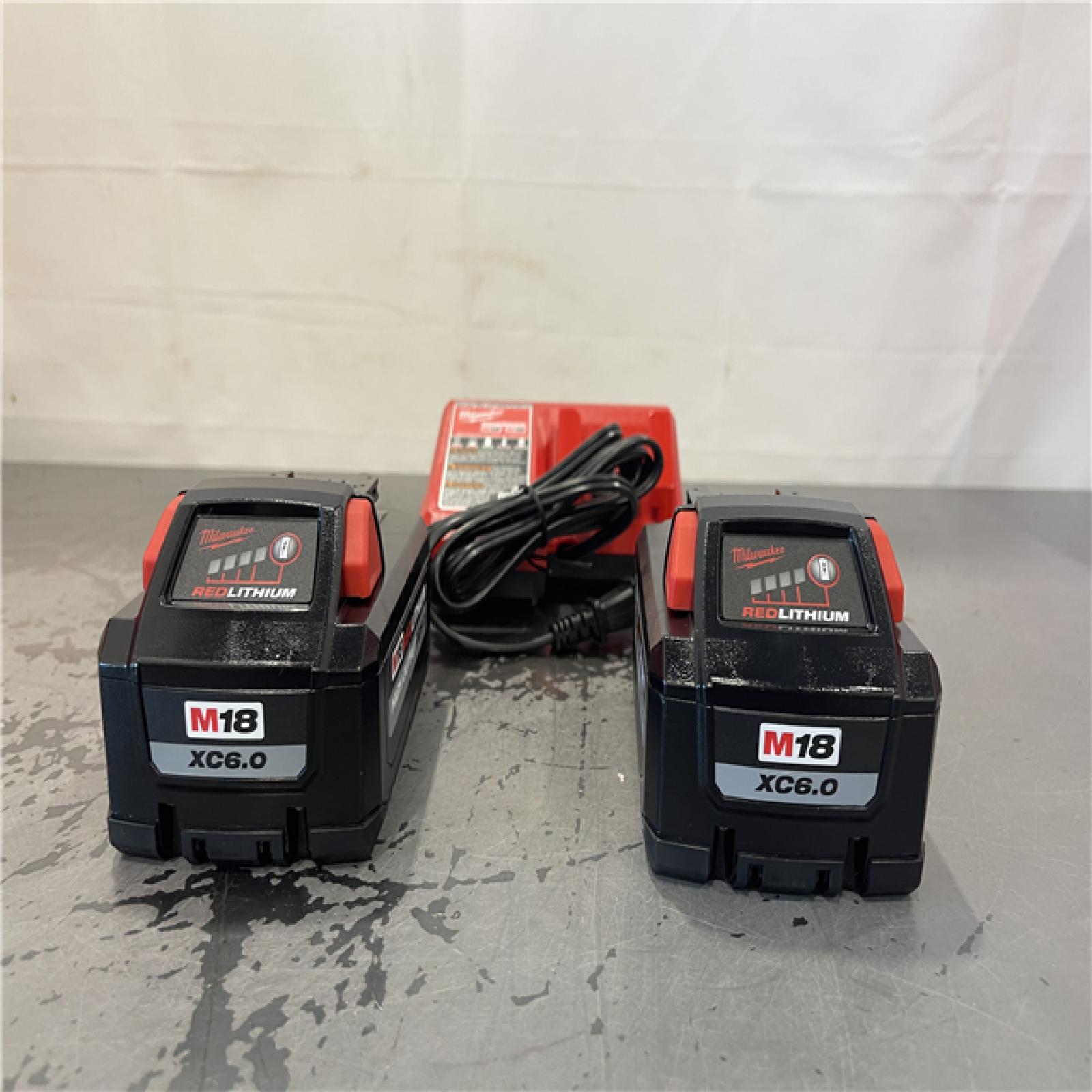 AS-IS- Milwaukee 18-Volt Lithium-Ion High Output Battery Starter Kit with Two 6.0 Ah Battery and Charger