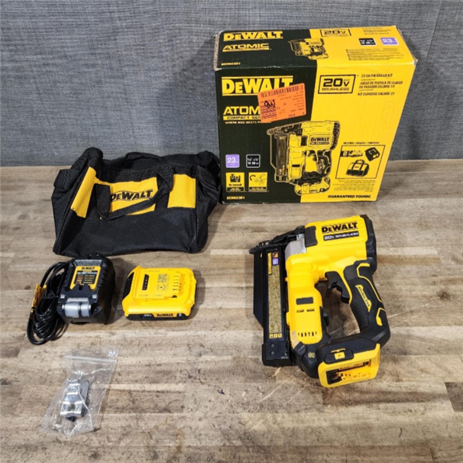 HOUSTON LOCATION - AS-IS DEWALT ATOMIC 20V MAX Lithium Ion Cordless 23 Gauge Pin Nailer Kit with 2.0Ah Battery and Charger