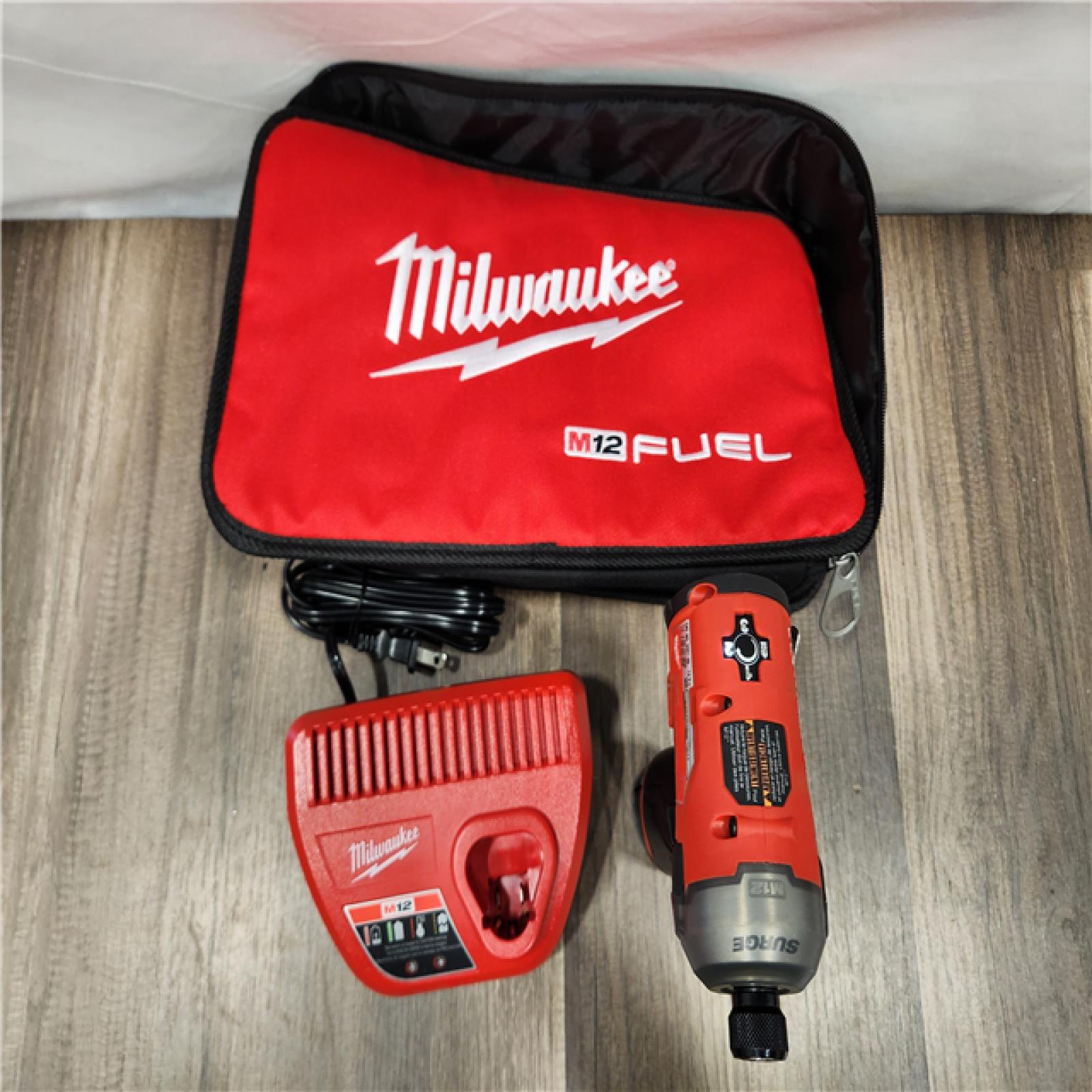 AS-IS Milwaukee M12 FUEL SURGE 12V Lithium-Ion Brushless Cordless 1/4 in. Hex Impact Driver Compact Kit w/Two 2.0Ah Batteries, Bag