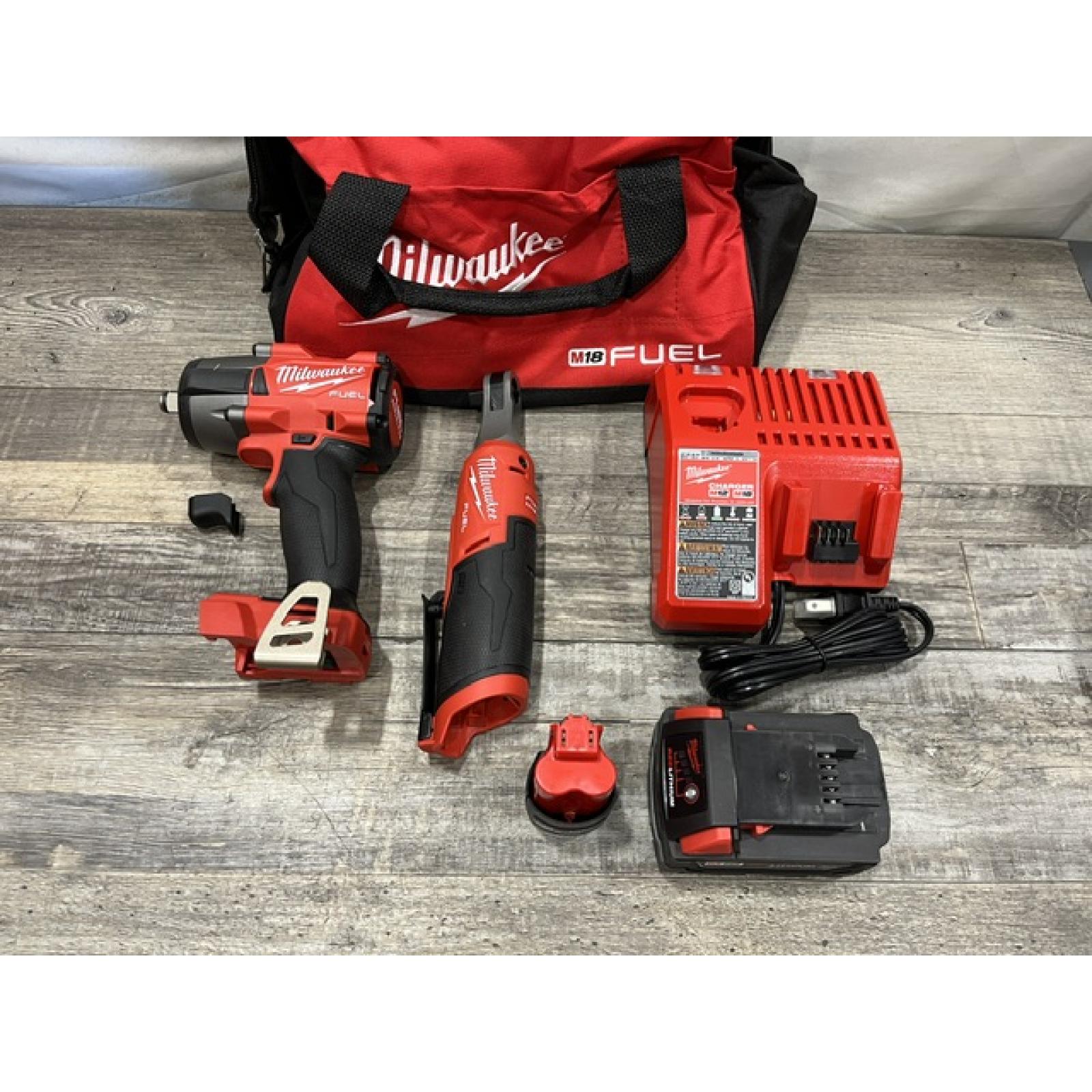 AS-IS Milwaukee FUEL 18V Cordless Mid Torque 1/2 in. Impact Wrench w/ 12 FUEL 3/8 in. Ratchet Combo Kit