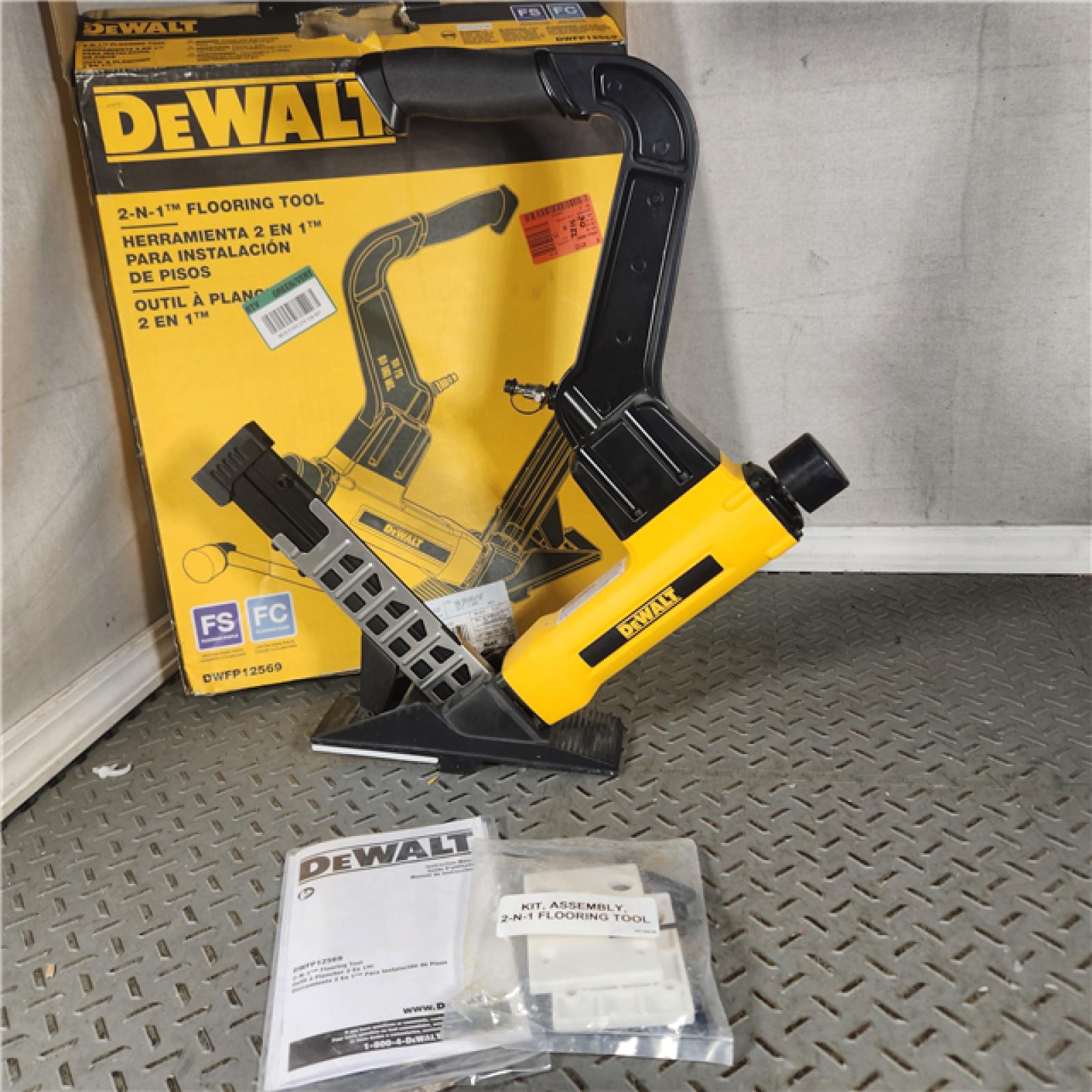 Houston Location ASIS DEWALT DWFP12569 2in1 Flooring Tool Appears