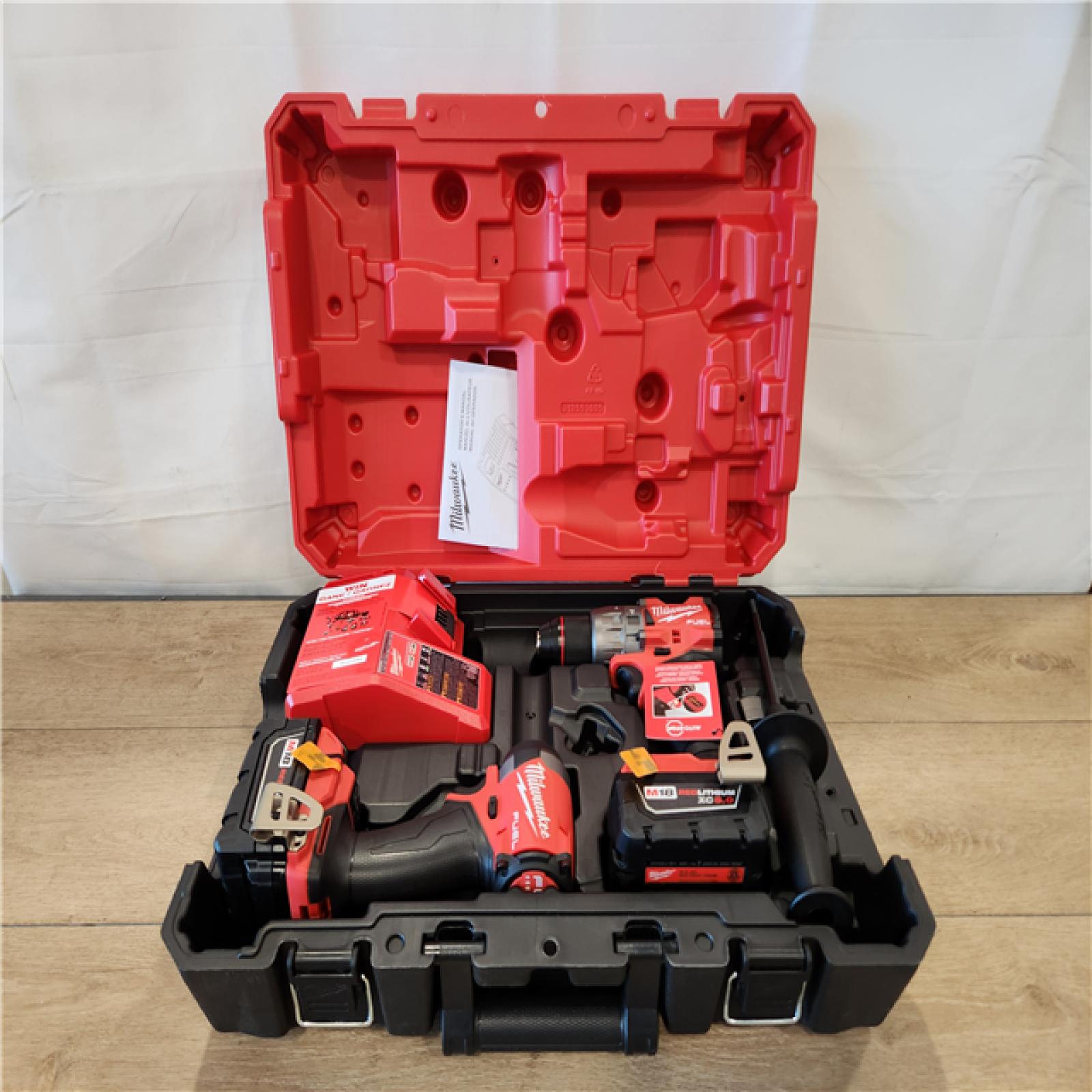 AS-IS- Milwaukee FUEL 18V Lithium-Ion Brushless Cordless Hammer Drill and Impact Driver Combo Kit