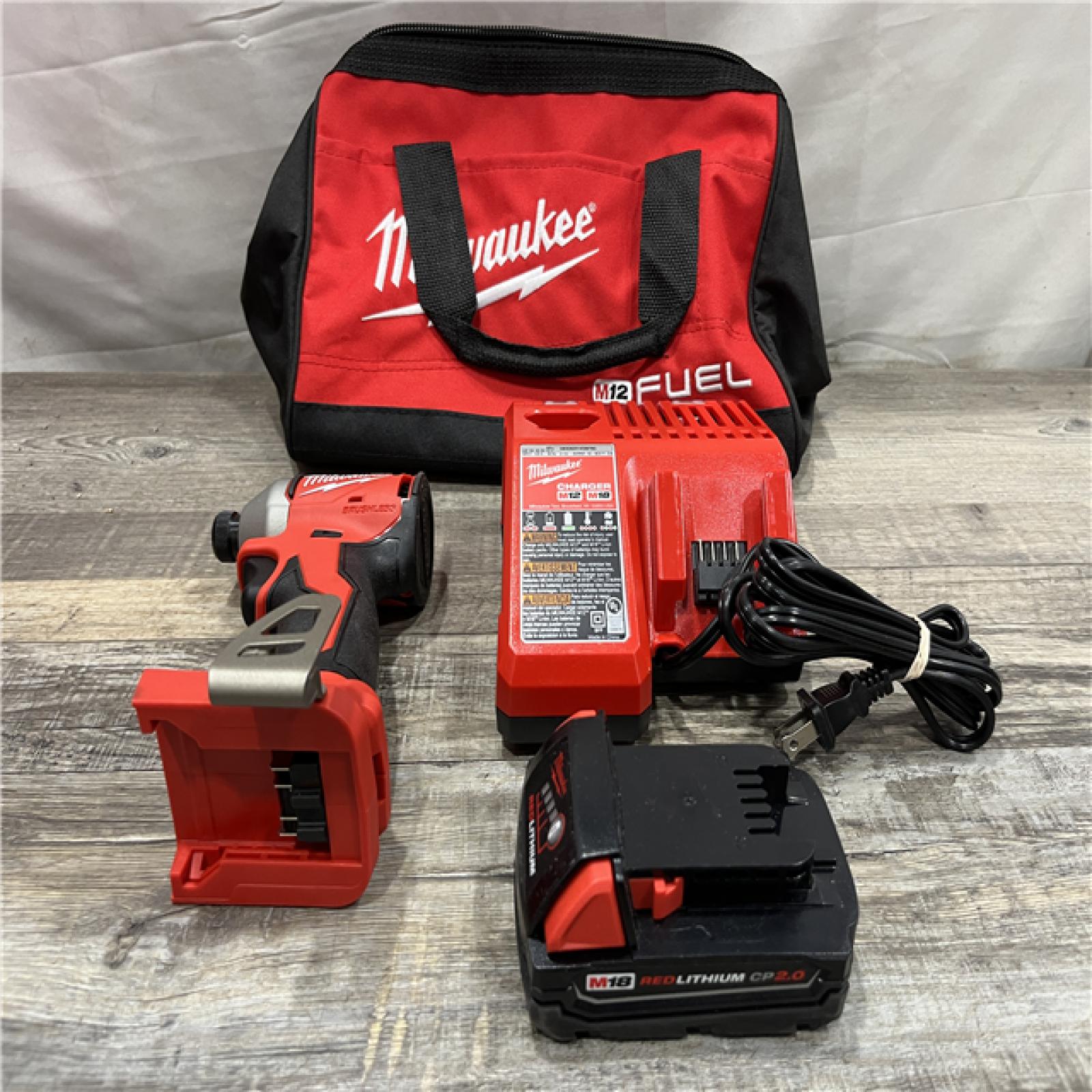 AS-IS Milwaukee 18-Volt Lithium-Ion Compact Brushless Cordless 1/4 in. Impact Driver Kit