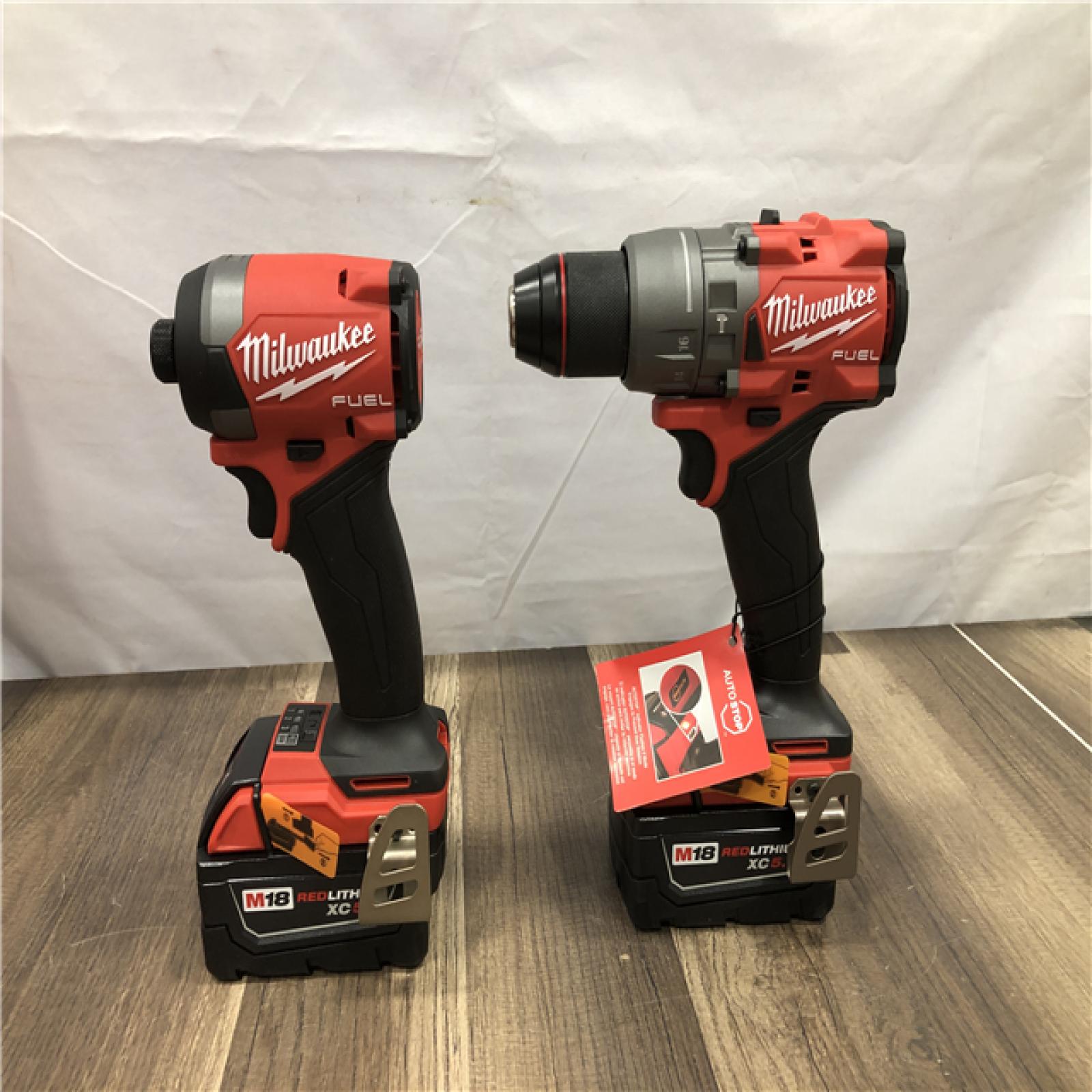 AS-IS Milwaukee FUEL 18V Lithium-Ion Brushless Cordless Hammer Drill and Impact Driver Combo Kit