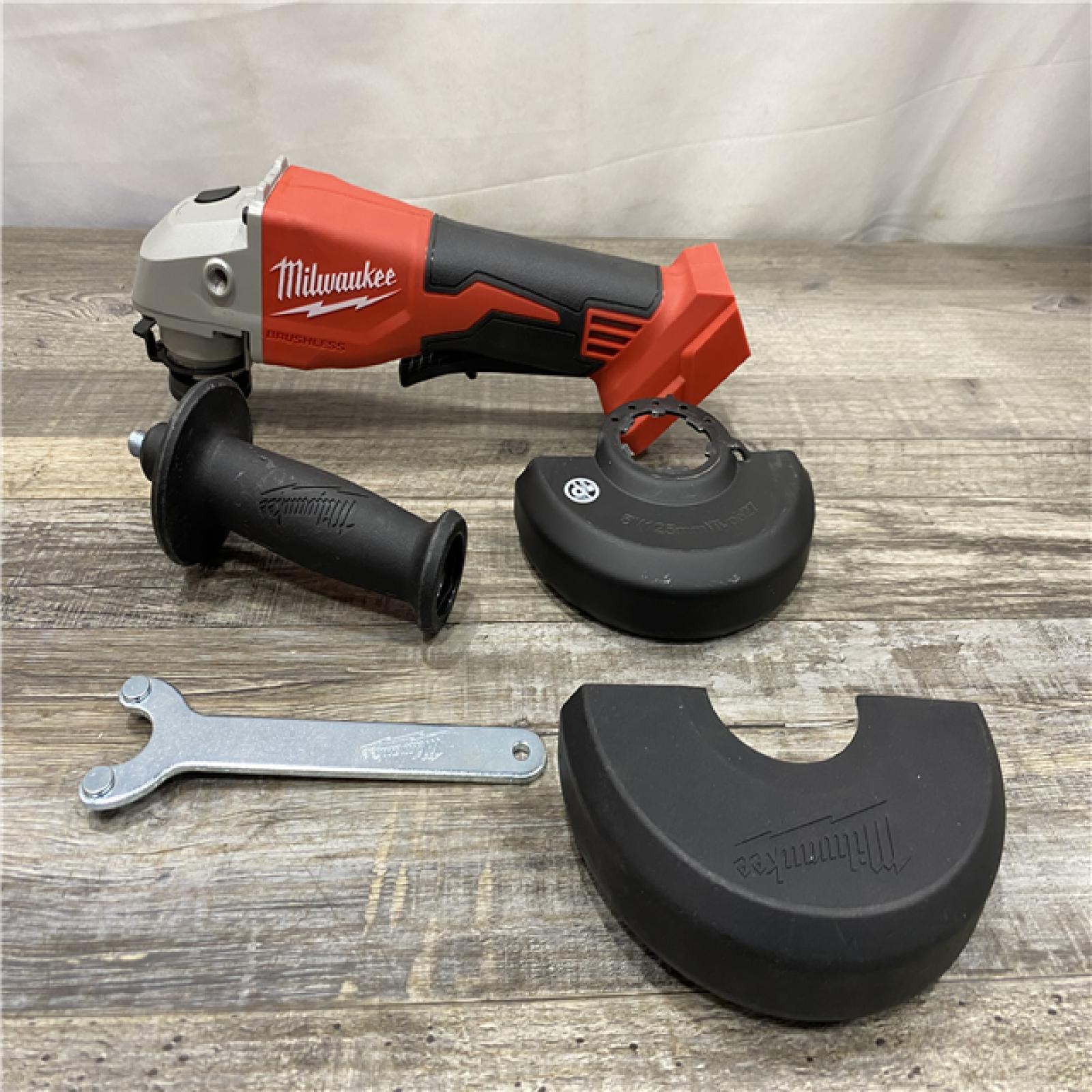 AS-IS Milwaukee 18V Lithium-Ion Brushless Cordless 4-1/2 in./5 in. Grinder w/Paddle Switch (Tool-Only)