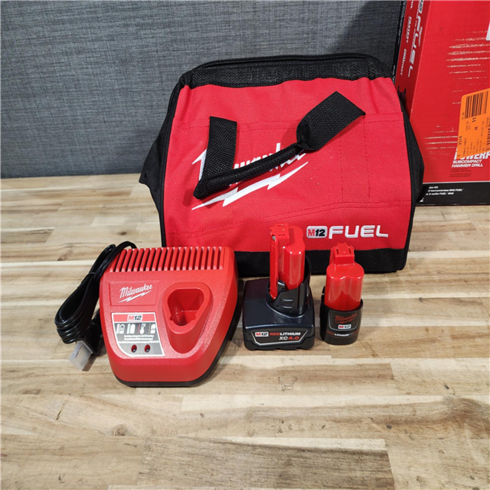 HOUSTON LOCATION - AS-IS (APPEARS LIKE NEW) Milwaukee FUEL 12-Volt Lithium-Ion Brushless Cordless Hammer Drill and Impact Driver Combo Kit