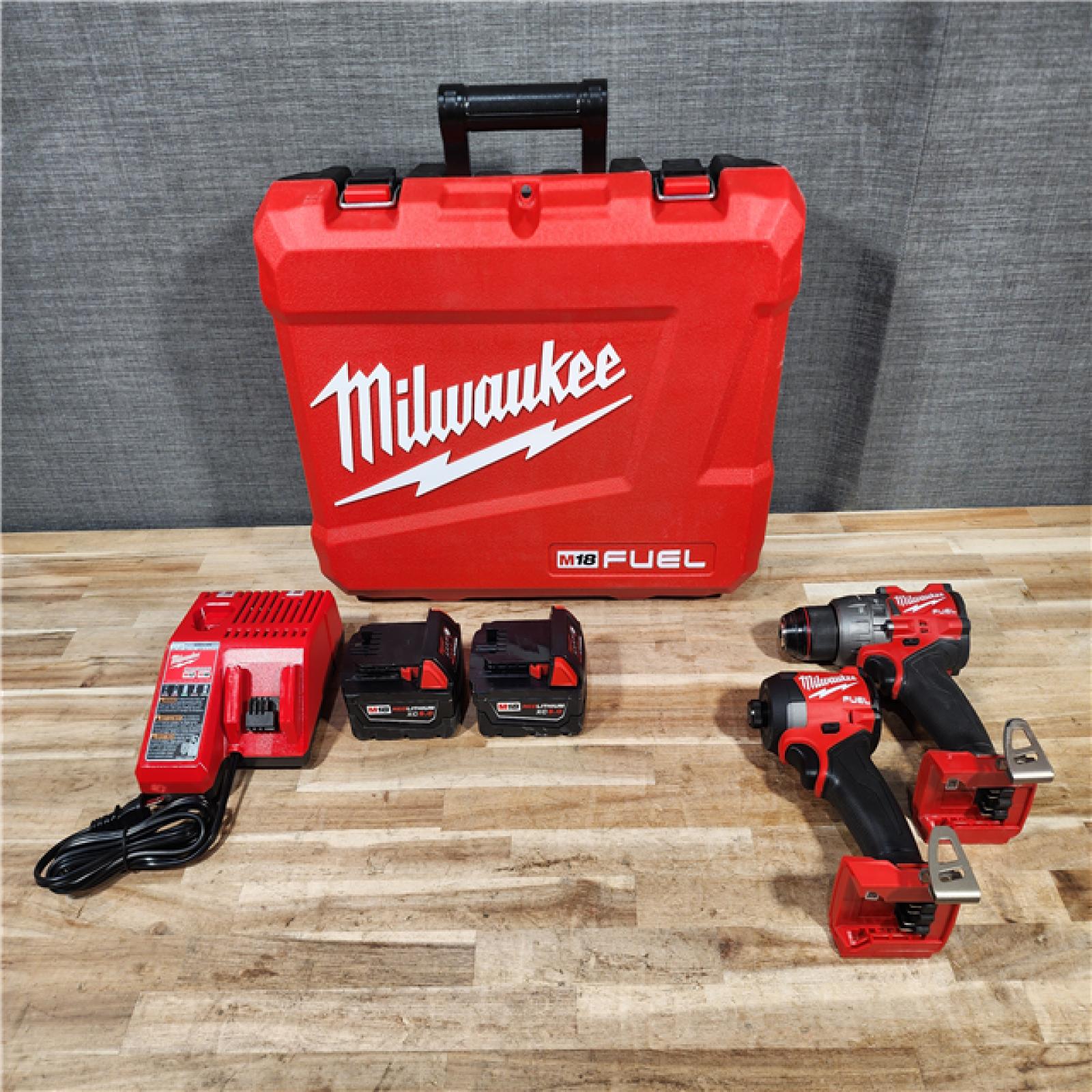 HOUSTON LOCATION - AS-IS Milwaukee FUEL 18V Lithium-Ion Brushless Cordless Hammer Drill and Impact Driver Combo Kit