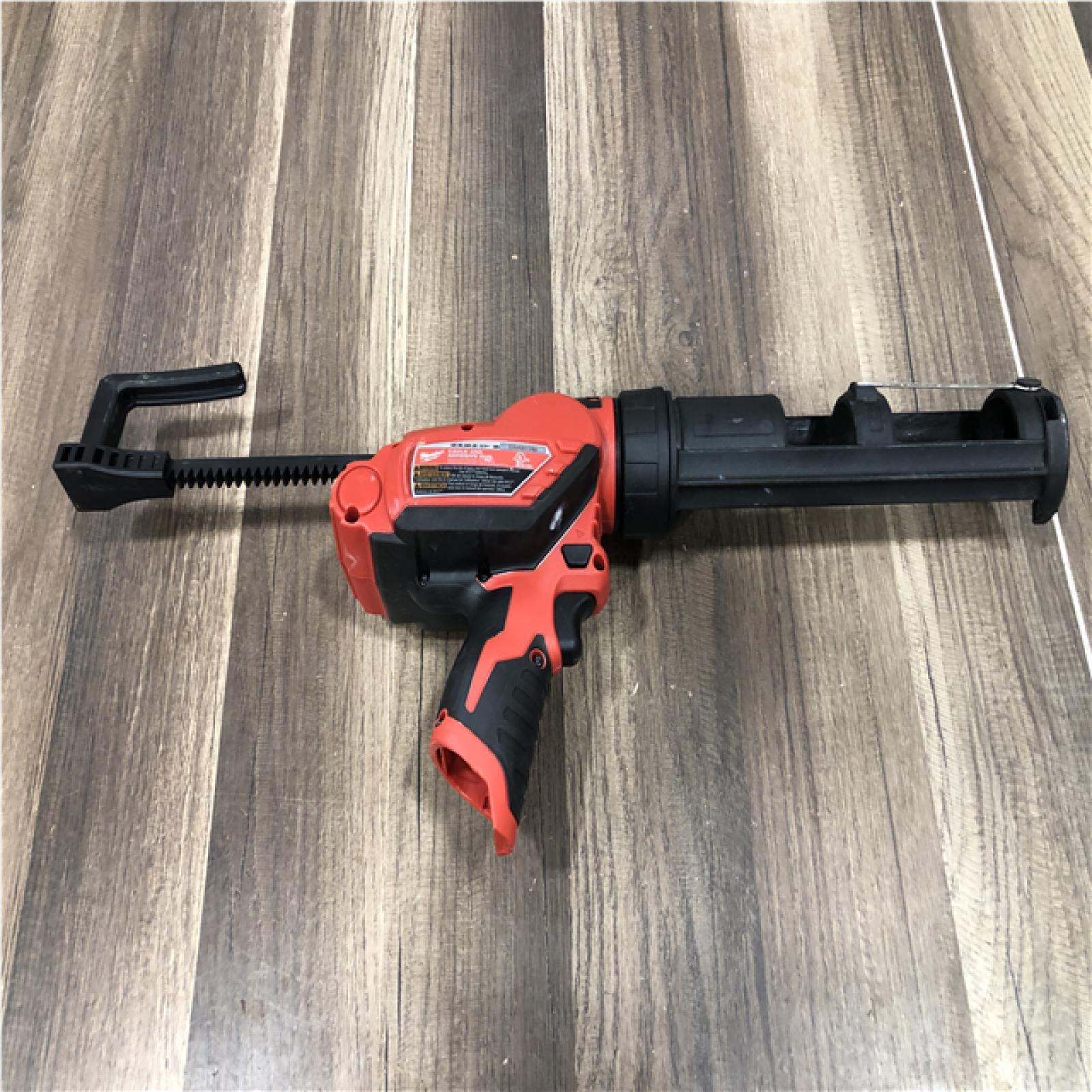 AS-IS Milwaukee 12V Lithium-Ion Cordless 10 oz. Adhesive and Caulk Gun (Tool-Only)
