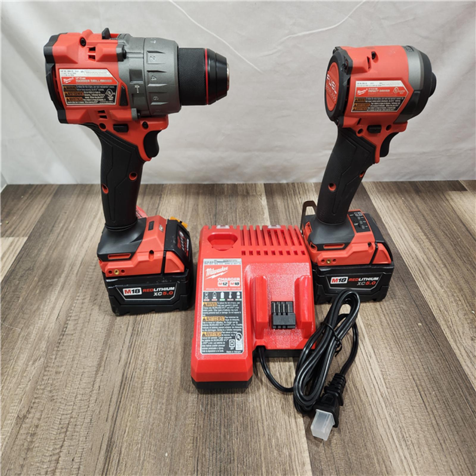 AS-IS- MILWAUKEE FUEL 18V Lithium-Ion Brushless Cordless Hammer Drill and Impact Driver Combo Kit