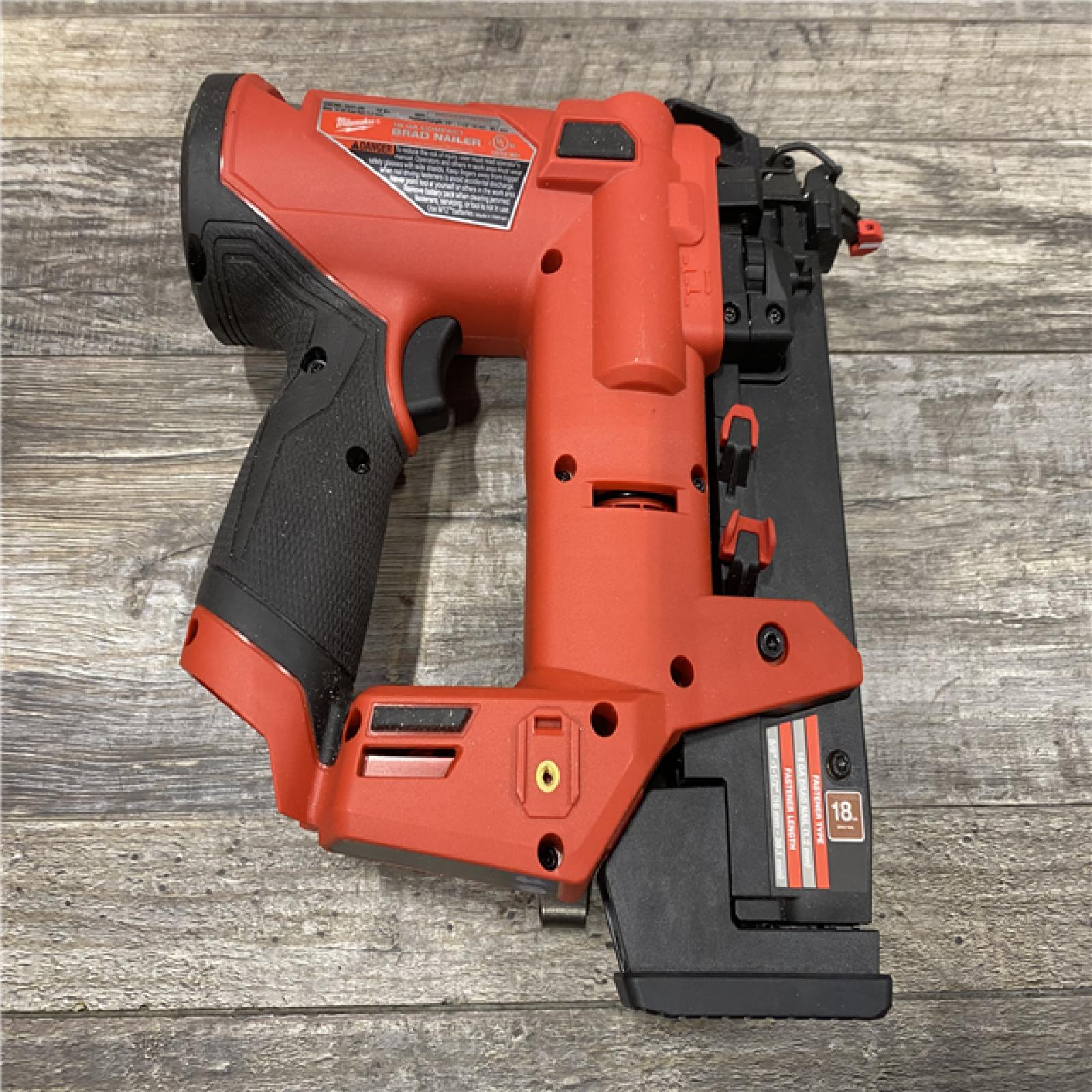 AS-IS Milwaukee  FUEL 12-Volt Lithium-Ion Brushless Cordless 18-Gauge 1-1/2 in. Compact Brad Nailer (Tool Only)