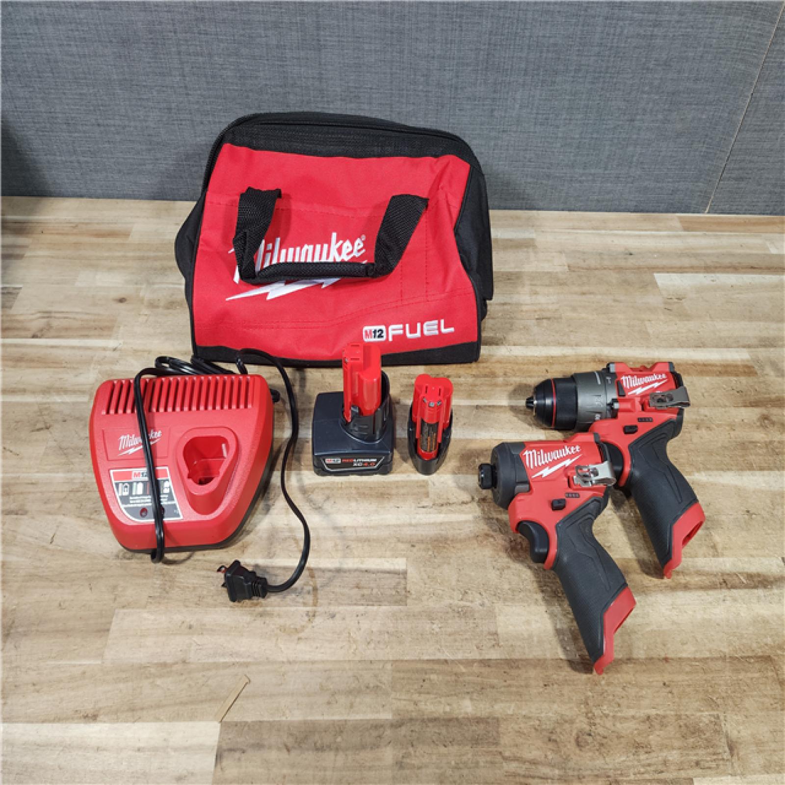HOUSTON LOCATION - AS - IS Milwaukee FUEL 12-Volt Lithium-Ion Brushless Cordless Hammer Drill and Impact Driver Combo Kit