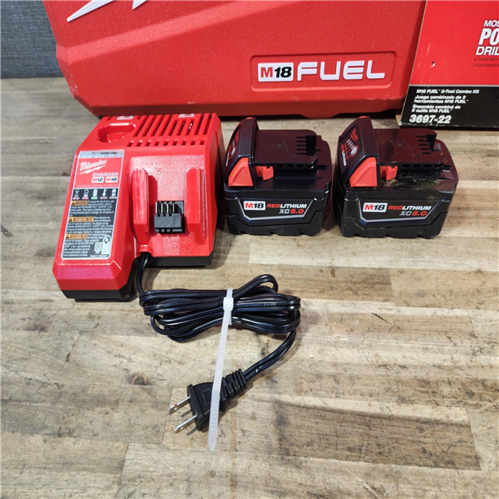HOUSTON LOCATION - AS-IS Milwaukee FUEL 18V Lithium-Ion Brushless Cordless Hammer Drill and Impact Driver Combo Kit