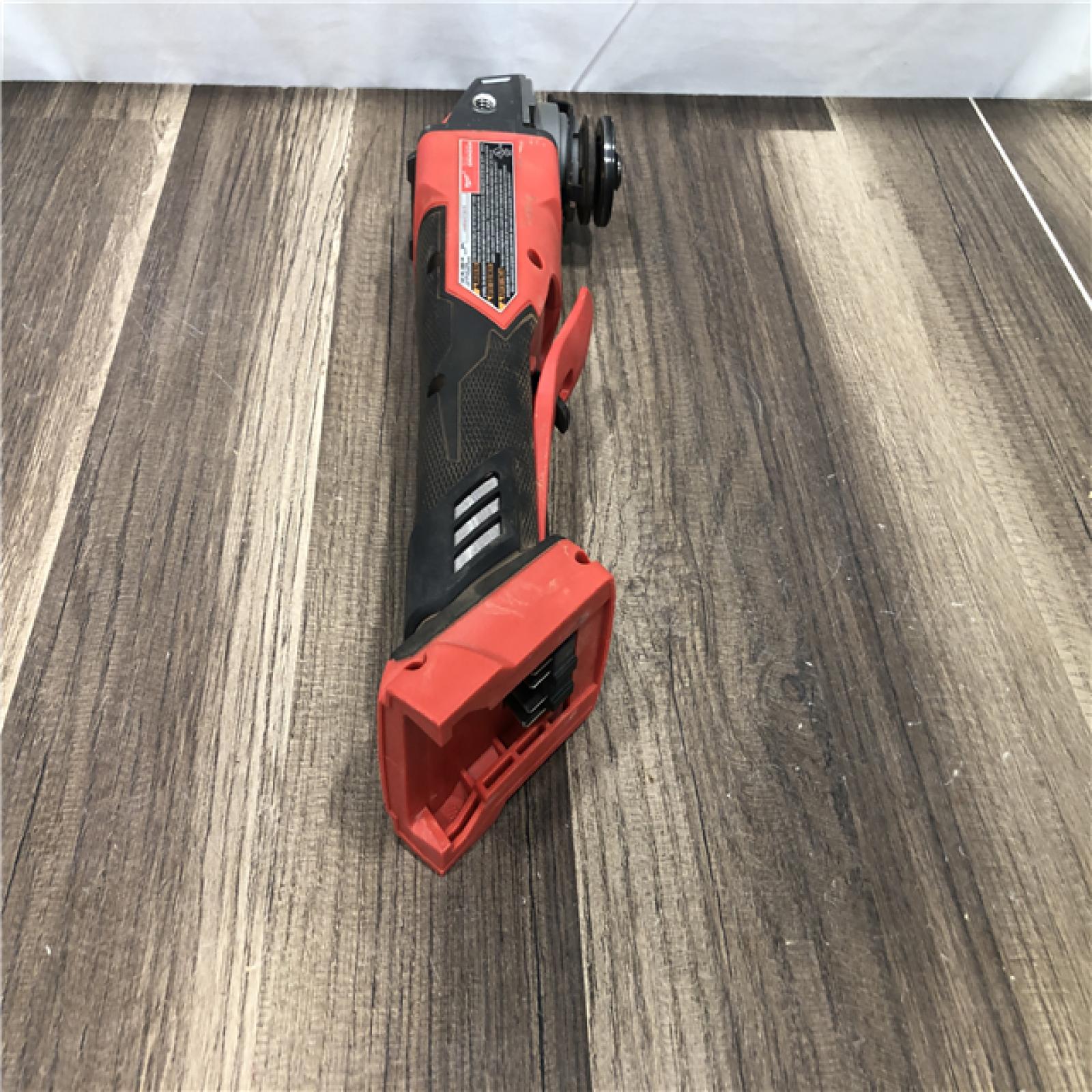 AS-IS Milwaukee FUEL 18V Lithium-Ion Brushless Cordless 4-1/2 in./5 in. Grinder w/Paddle Switch (Tool-Only)