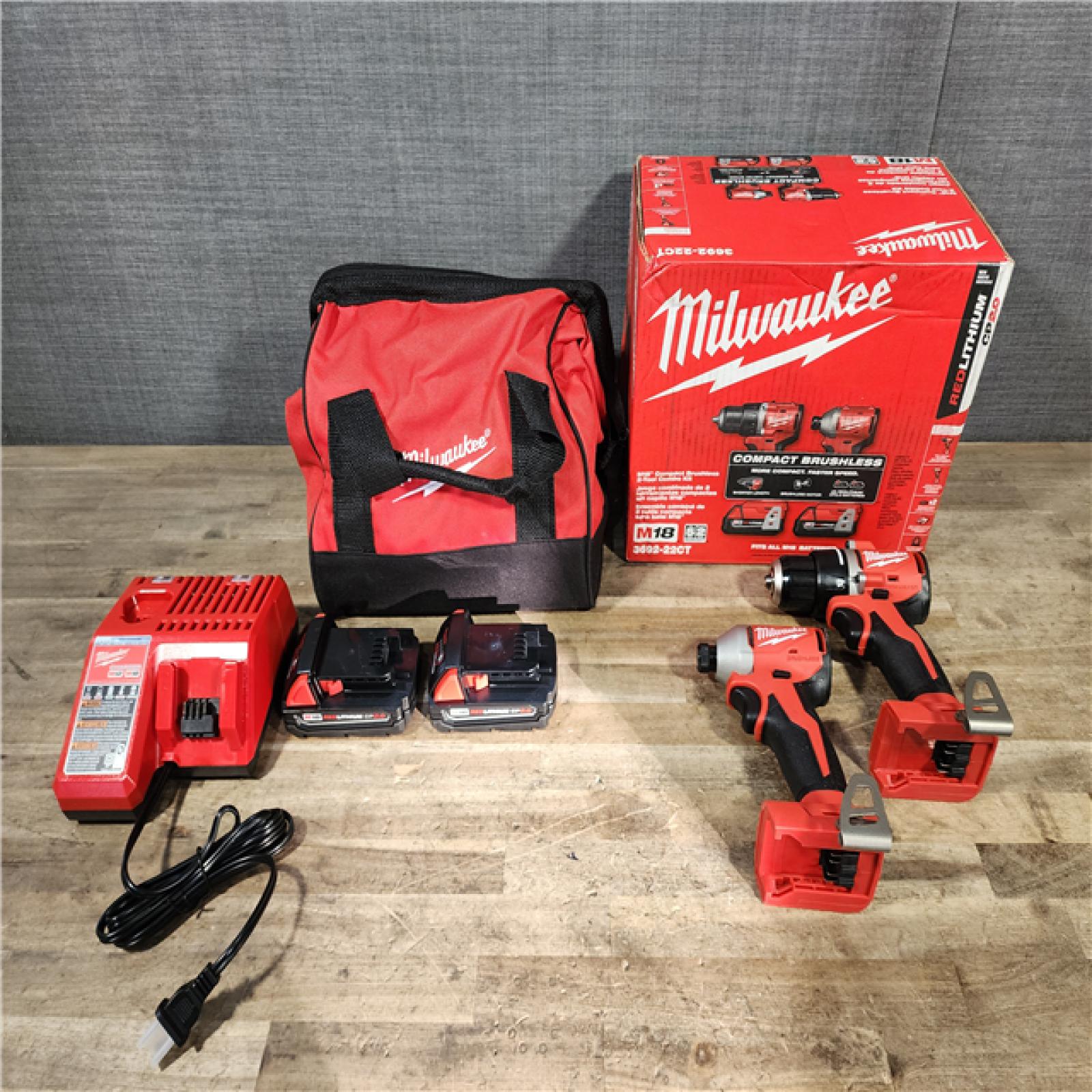 HOUSTON LOCATION - AS-IS Milwaukee M18 18V Lithium-Ion Brushless Cordless Compact Drill/Impact Combo Kit (2-Tool) W/(2) 2.0 Ah Batteries  Charger & Bag