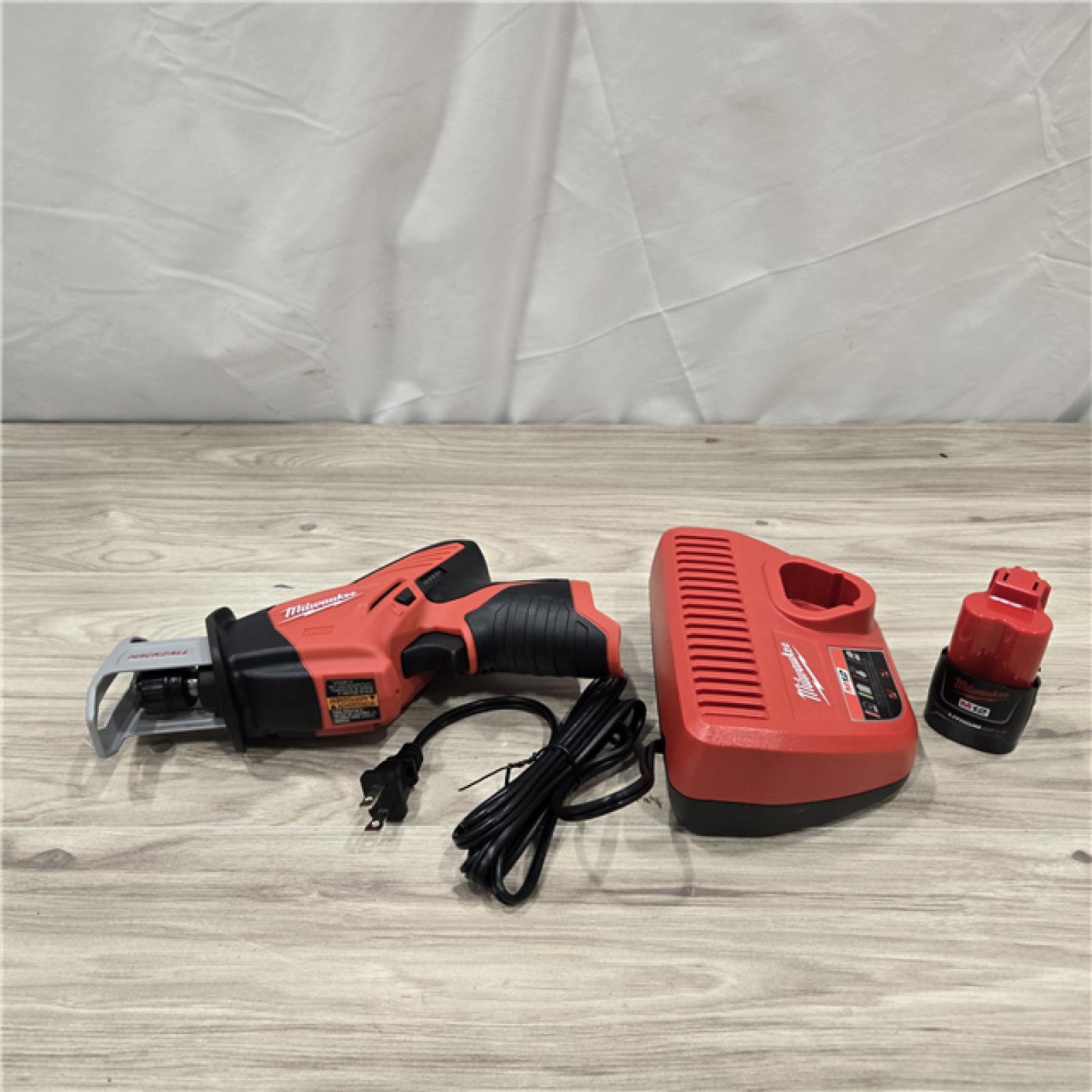 AS-IS Milwaukee 2420-21 12V 1.5Ah Cordless Straight Handle Reciprocating Saw Kit