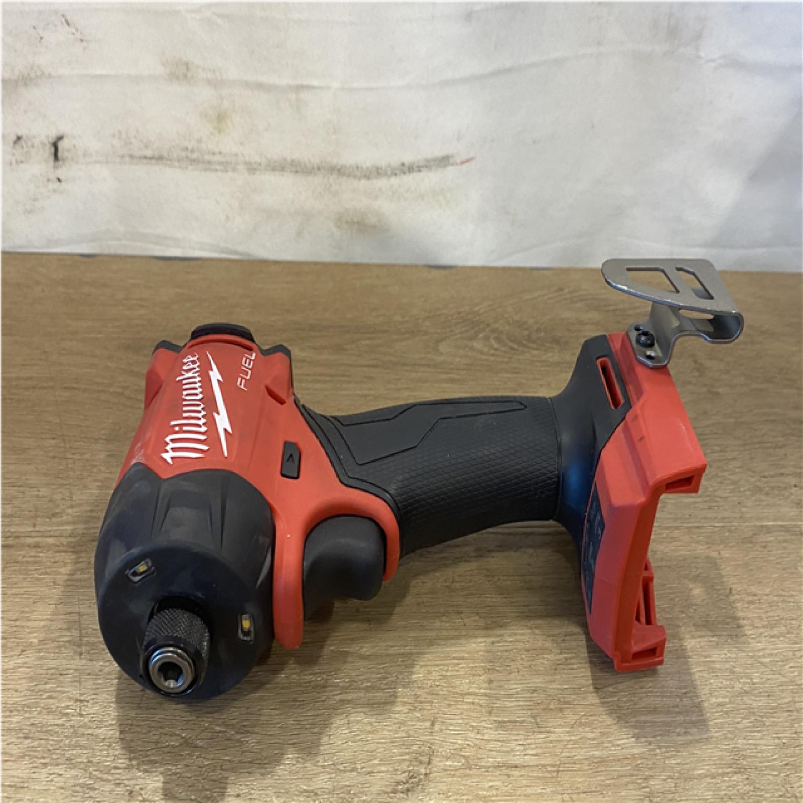 AS-IS  Milwaukee FUEL SURGE 18V Lithium-Ion Brushless Cordless 1/4 in. Hex Impact Driver (Tool-Only)