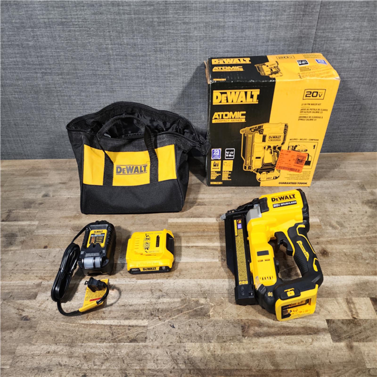 HOUSTON LOCATION - AS-IS DEWALT ATOMIC 20V MAX Lithium Ion Cordless 23 Gauge Pin Nailer Kit