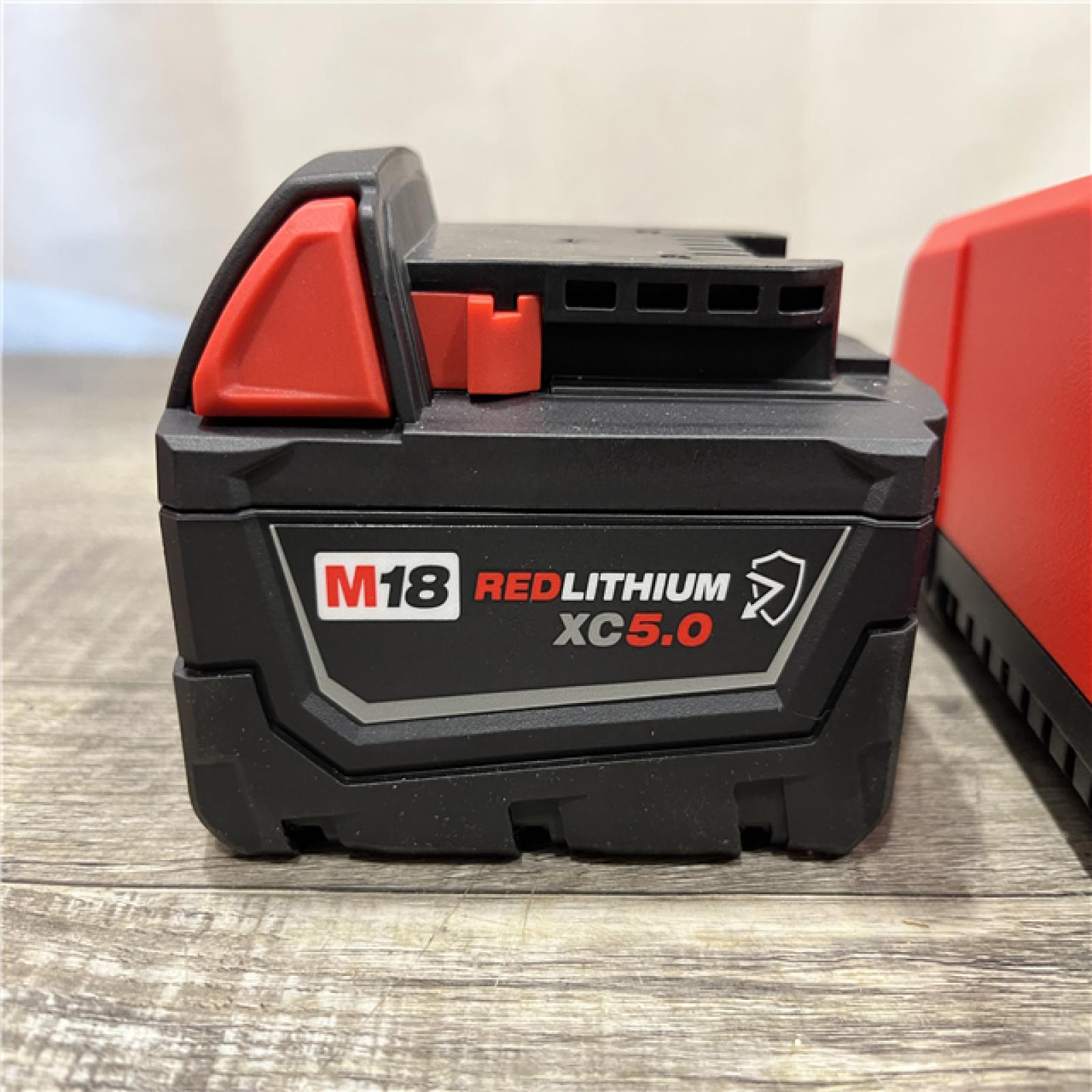 AS-IS Milwaukee 18-Volt Lithium-Ion XC Starter Kit with One 5.0Ah Battery and Charger
