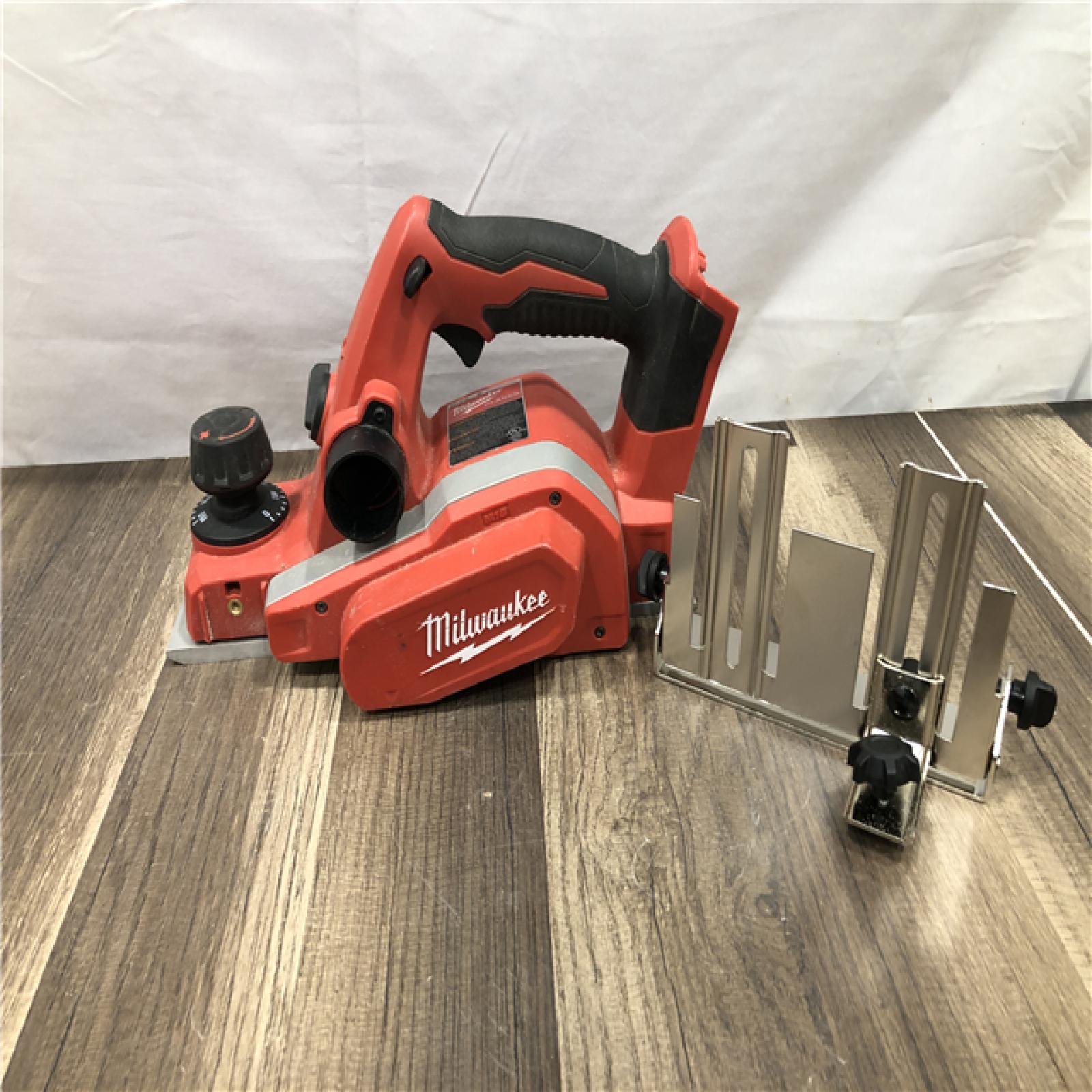 AS-IS Milwaukee M18 18V Lithium-Ion Cordless 3-1/4 in. Planer (Tool-Only)