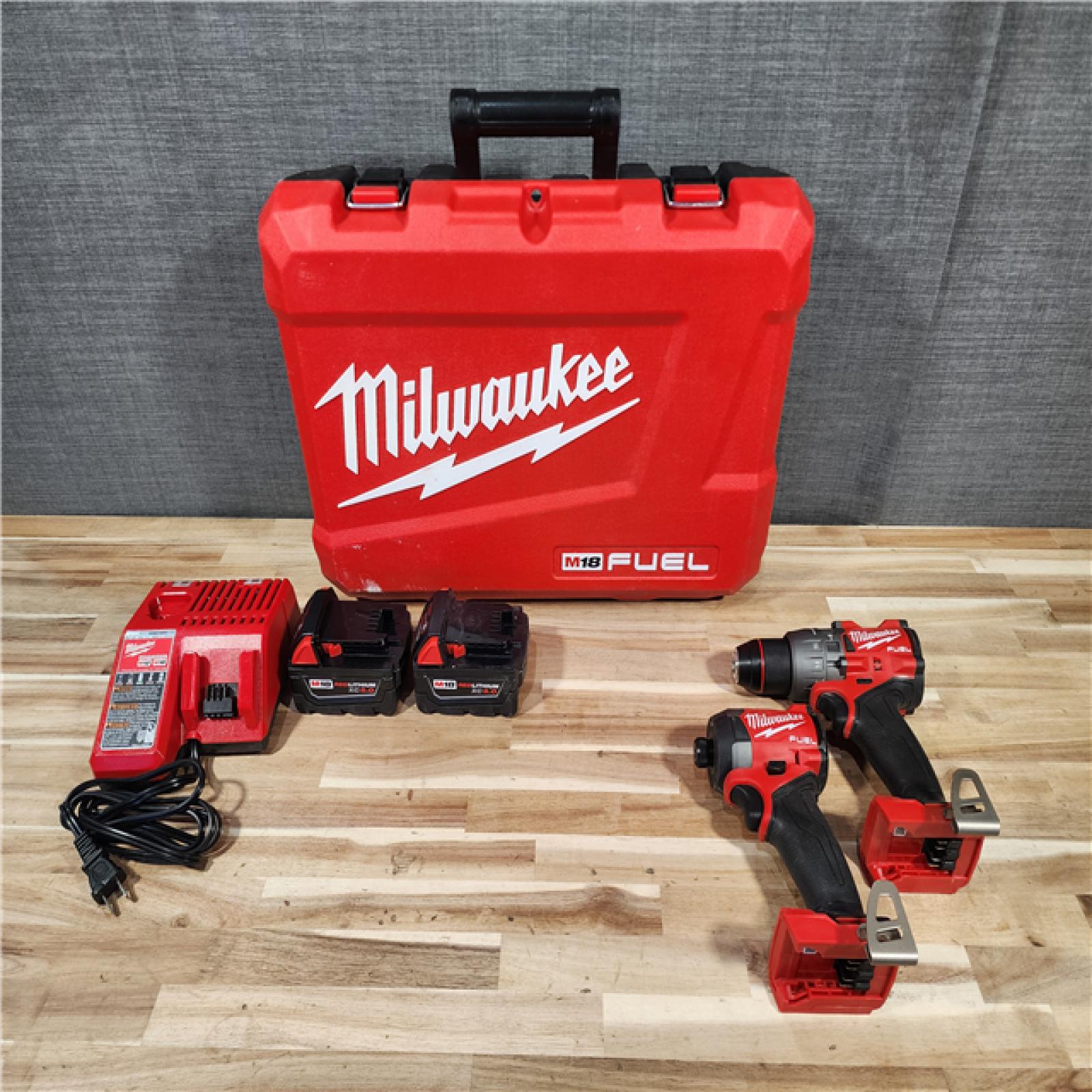HOUSTON LOCATION - AS-IS Milwaukee  FUEL 18V Lithium-Ion Brushless Cordless Hammer Drill and Impact Driver Combo Kit