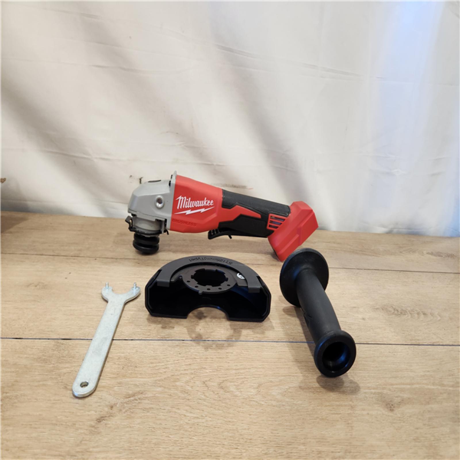 AS-IS- Milwaukee 18V Lithium-Ion Brushless Cordless 4-1/2 in./5 in. Grinder w/Paddle Switch (Tool-Only)