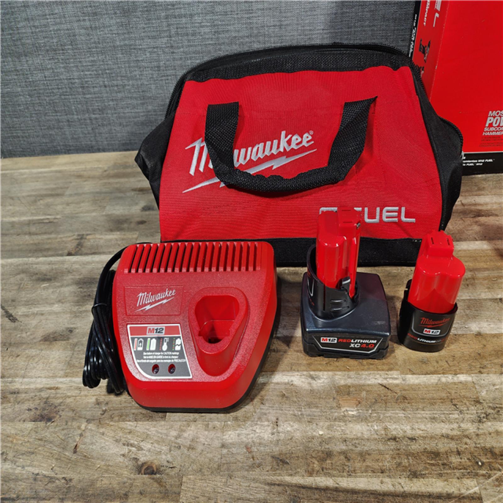 HOUSTON LOCATION - AS-IS Milwaukee FUEL 12-Volt Lithium-Ion Brushless Cordless Hammer Drill and Impact Driver Combo Kit