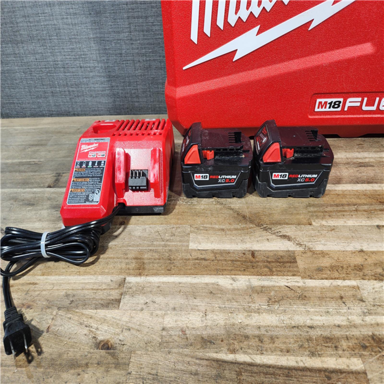 HOUSTON LOCATION - AS-IS Milwaukee FUEL 18V Lithium-Ion Brushless Cordless Hammer Drill and Impact Driver Combo Kit