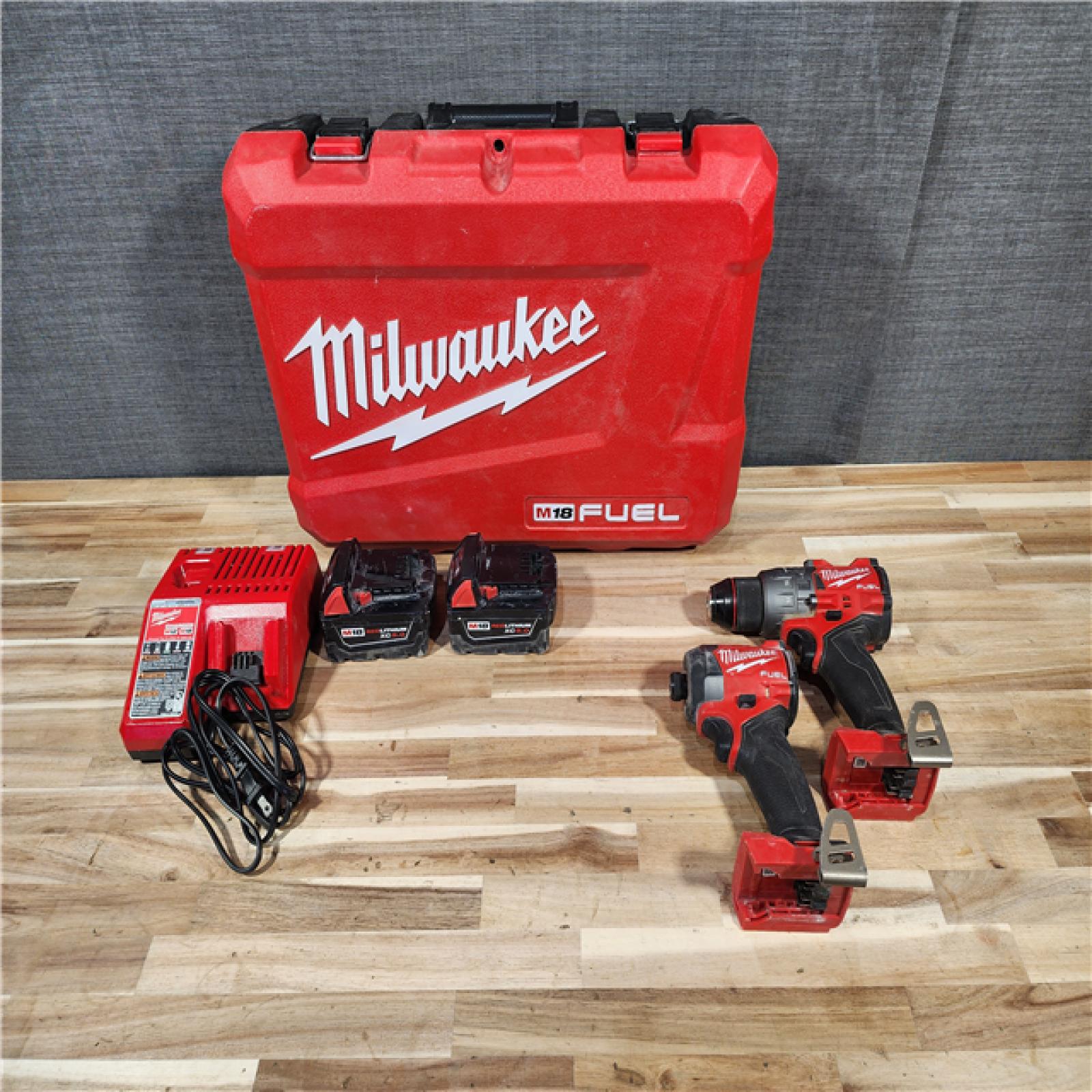 HOUSTON LOCATION - AS-IS Milwaukee  FUEL 18V Lithium-Ion Brushless Cordless Hammer Drill and Impact Driver Combo Kit