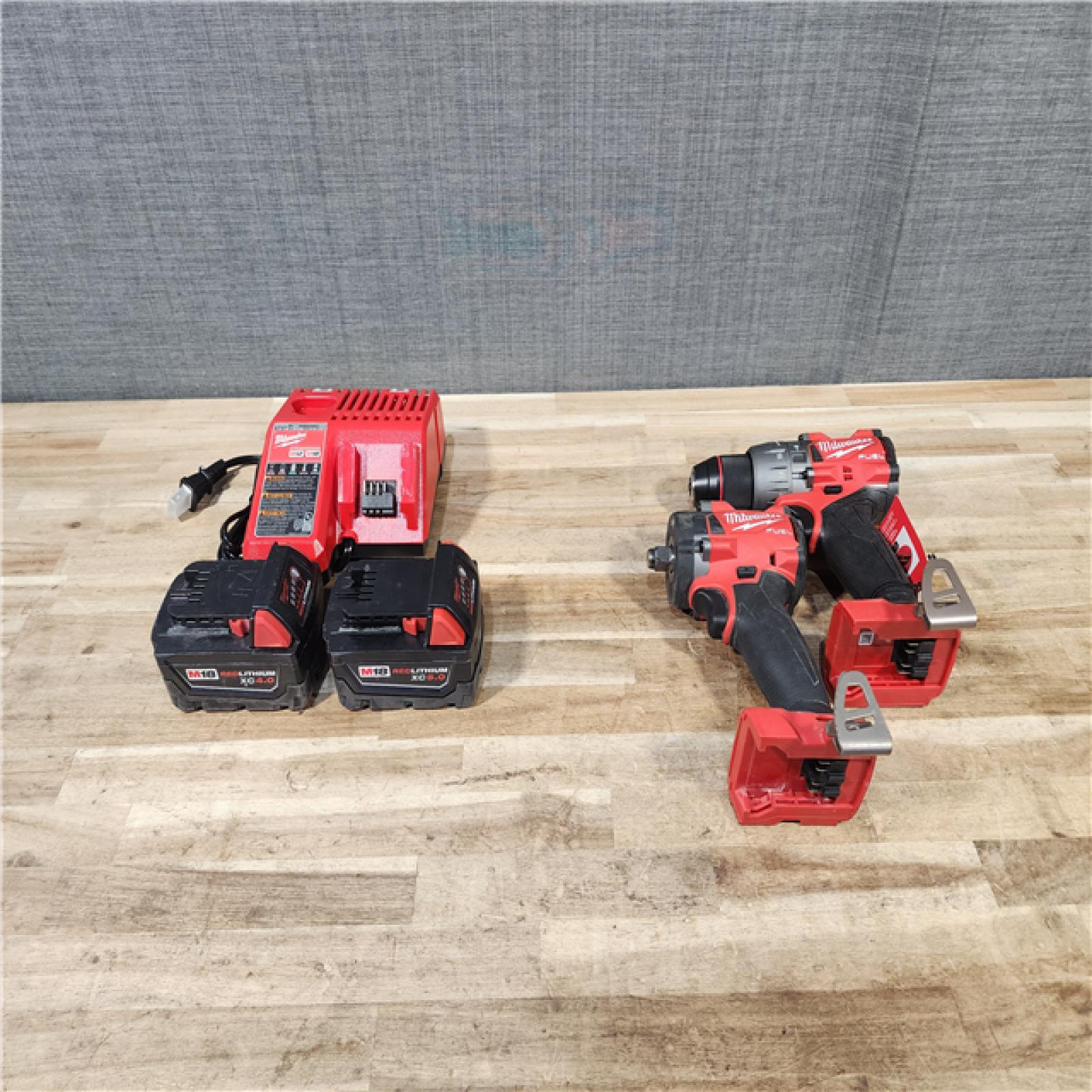 HOUSTON LOCATION - AS-IS MILWAUKEE 2 TOOL COMBO KIT W/ (2) BATTERY & CHARGER