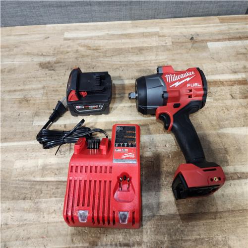 Houston Location AS-IS Milwaukee FUEL Impact and Battery with Charger