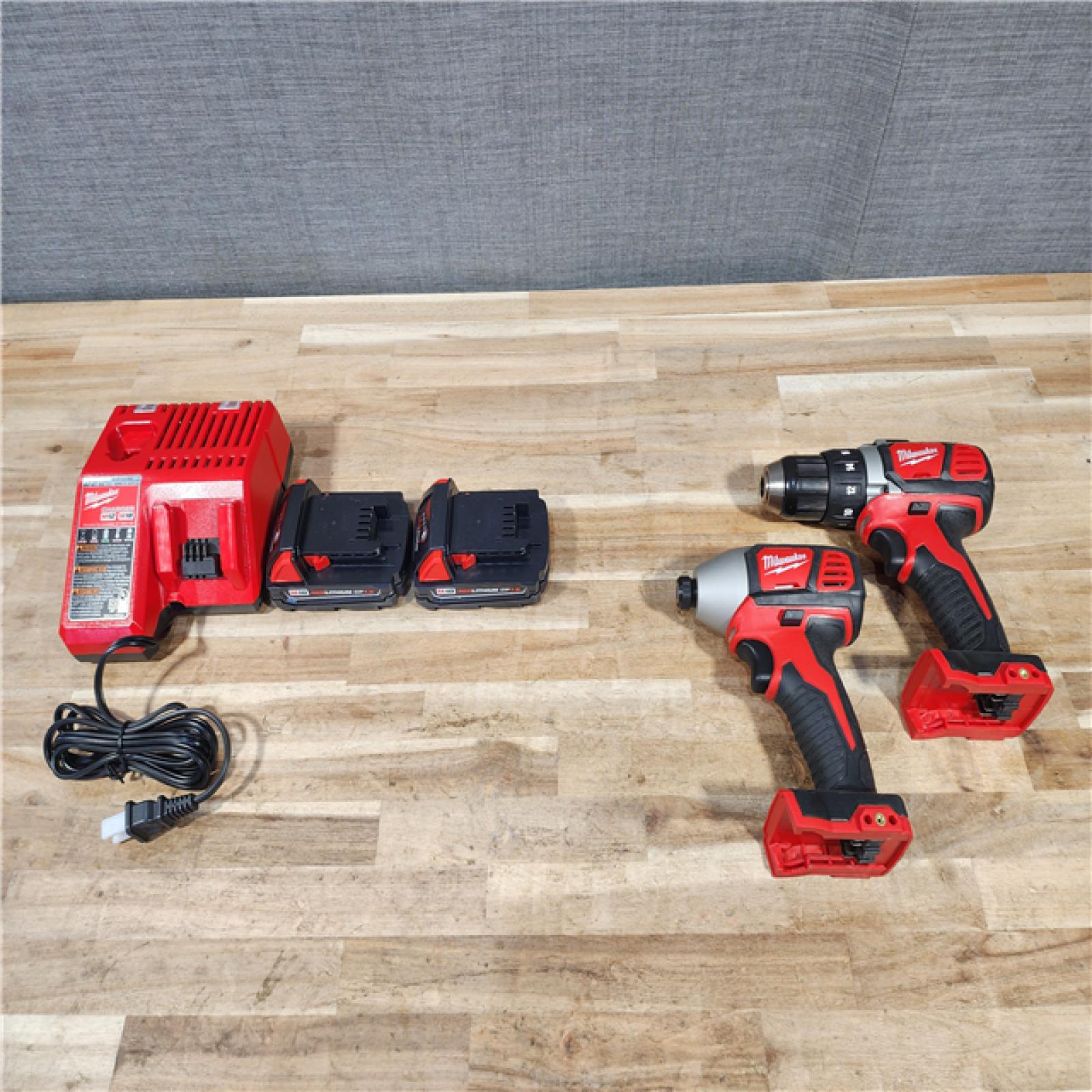 HOUSTON LOCATION - AS-IS Milwaukee 18V Lithium-Ion Cordless Drill Driver/Impact Driver Combo Kit