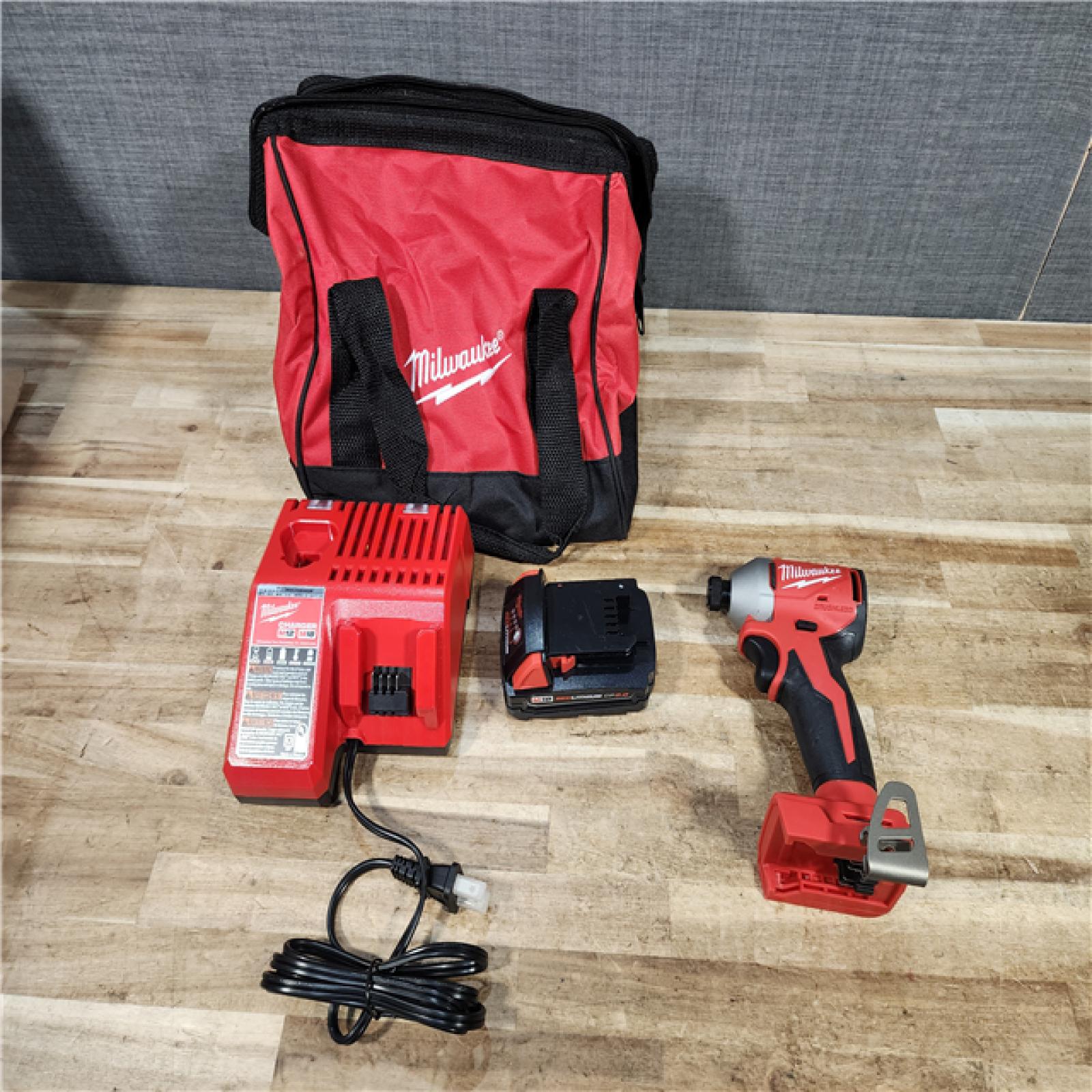 HOUSTON LOCATION - AS - IS Milwaukee 18-Volt Lithium-Ion Compact Brushless Cordless 1/4 in. Impact Driver Kit