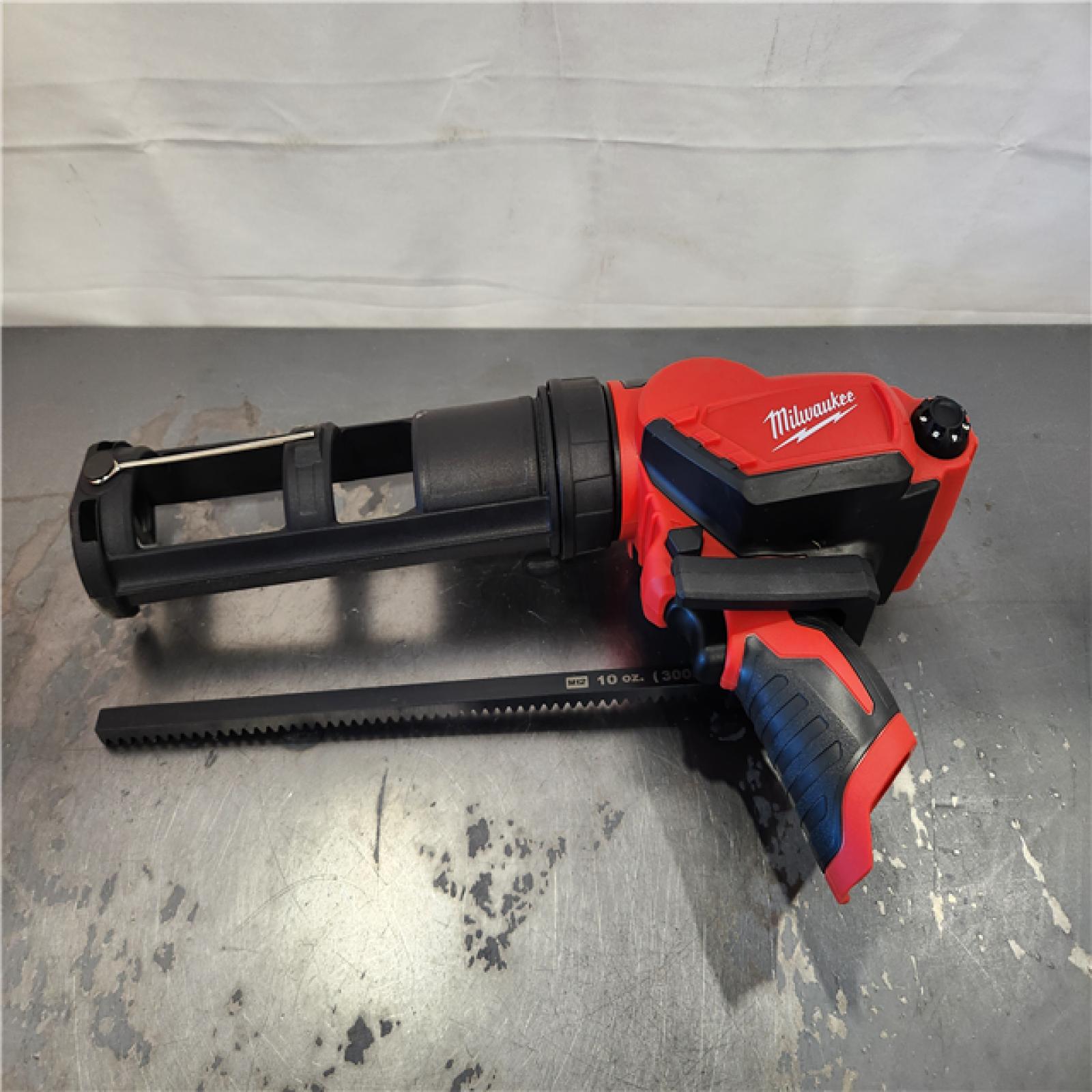 AS-IS- Milwaukee 12V Lithium-Ion Cordless 10 oz. Adhesive and Caulk Gun (Tool-Only)