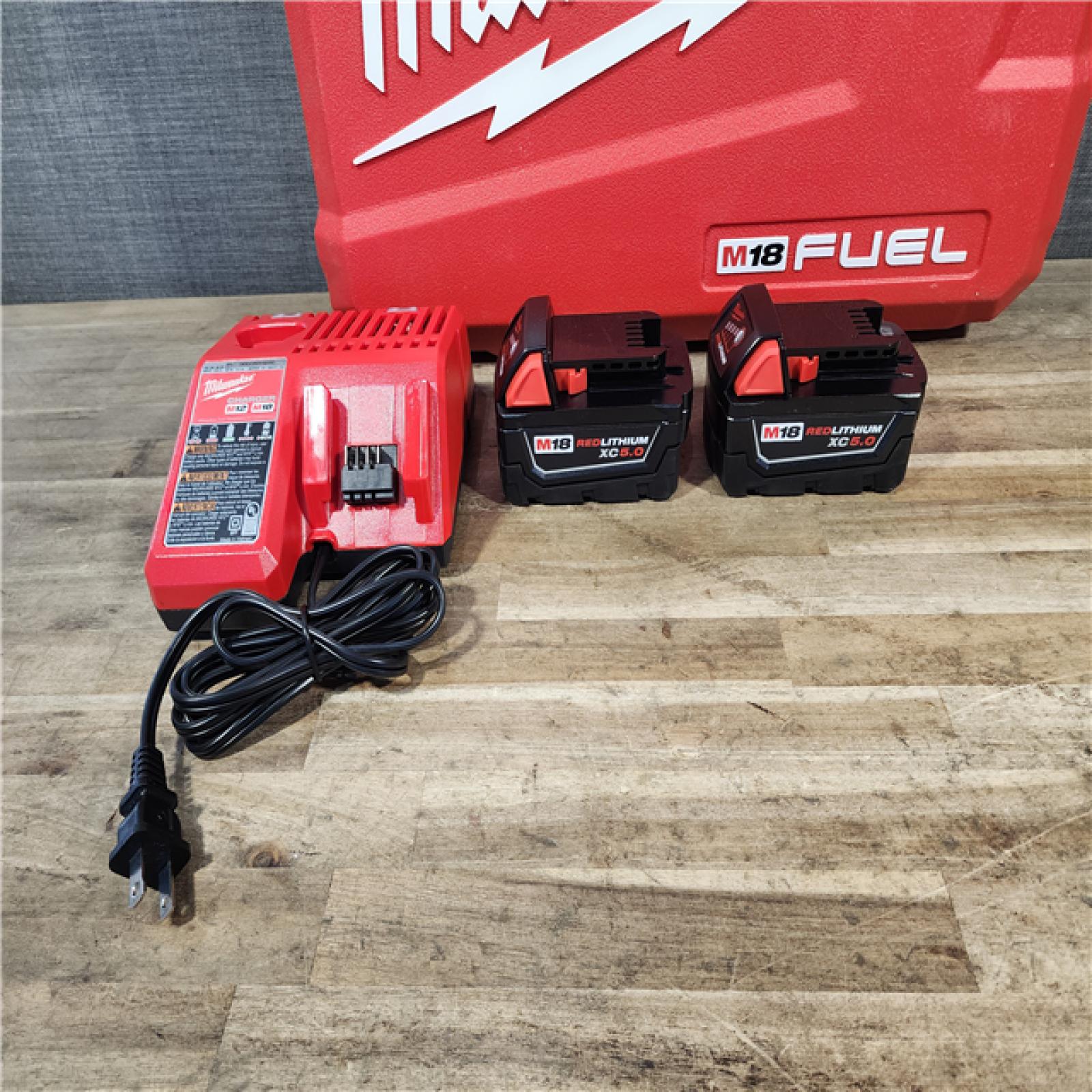 HOUSTON LOCATION - AS-IS (APPEARS LIKE NEW) Milwaukee  FUEL 18V Lithium-Ion Brushless Cordless Hammer Drill and Impact Driver Combo Kit