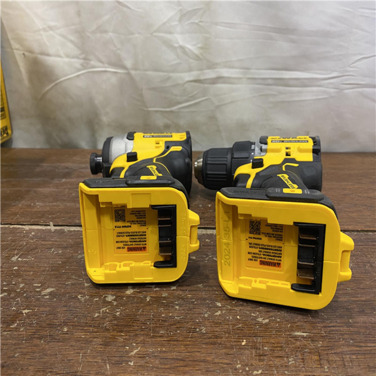 AS-IS Dewalt DCK225D2 20V MAX ATOMIC Brushless Compact Lithium-Ion 1/2 in. Cordless Drill Driver and 1/4 in. Impact Driver Combo Kit with 2 Batteries 2 Ah