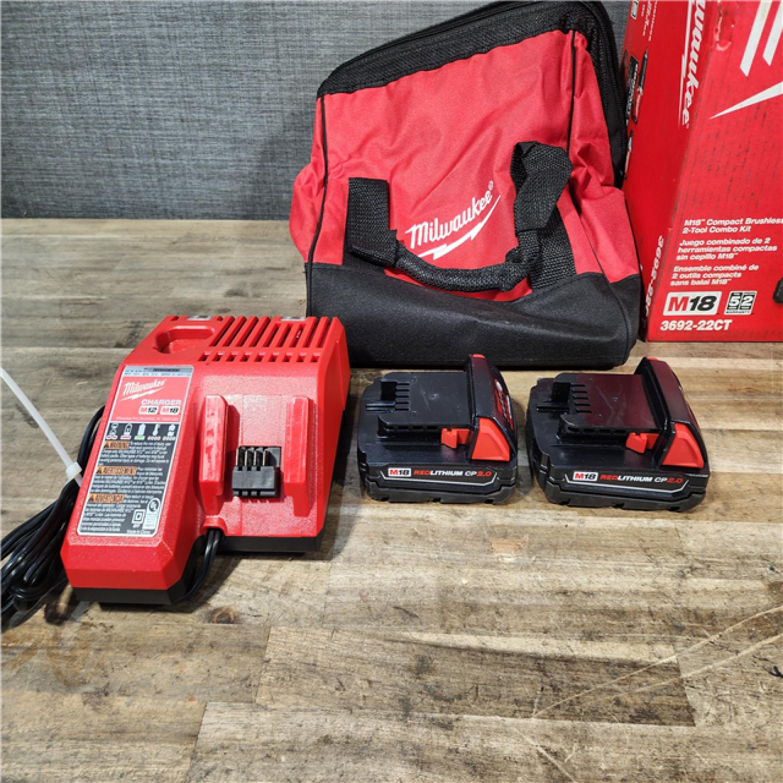 HOUSTON LOCATION - AS-IS Milwaukee M18 18V Lithium-Ion Brushless Cordless Compact Drill/Impact Combo Kit (2-Tool) W/(2) 2.0 Ah Batteries  Charger & Bag