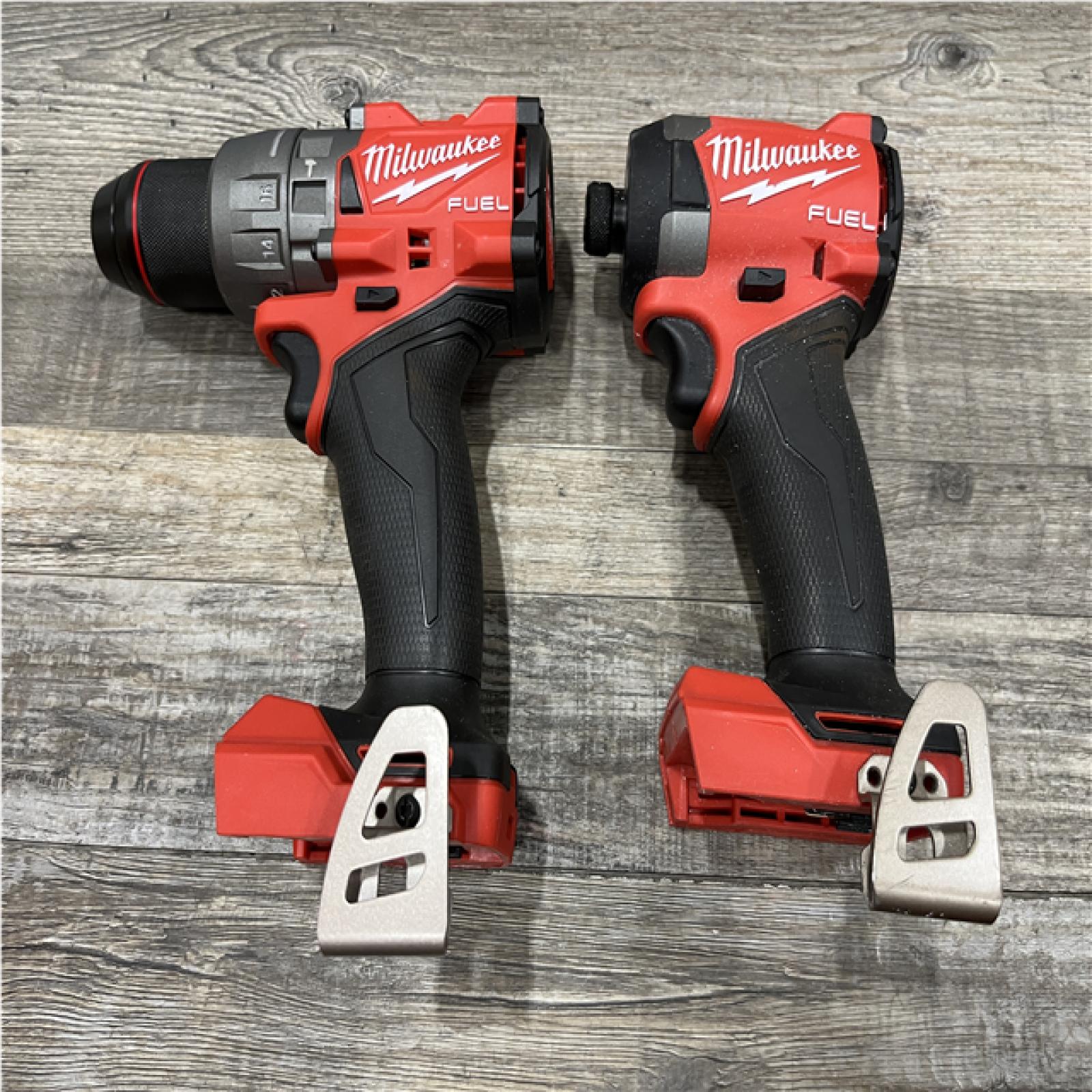AS-IS Milwaukee FUEL 18V Lithium-Ion Brushless Cordless Hammer Drill and Impact Driver Combo Kit